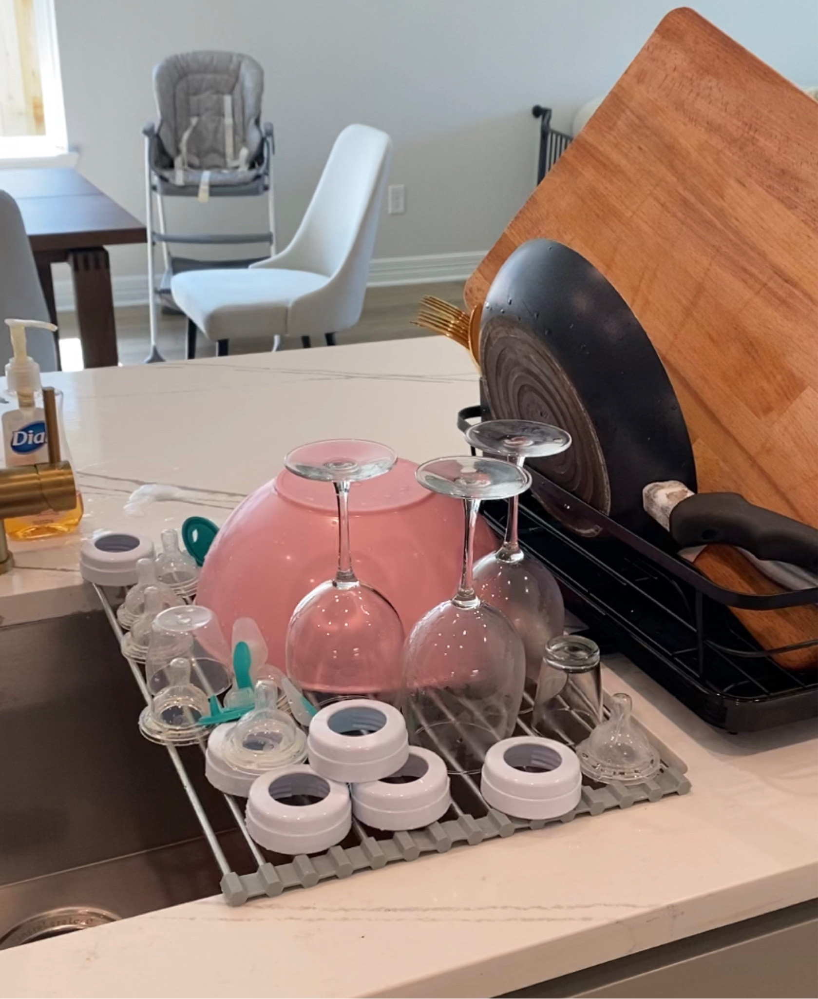 My favorite drainers ! The first one is simple enough for a few dishes and the second one is my favorite because it has a little pipe to drain the water back in the sink ! 

#LTKfamily #LTKunder50 #LTKhome