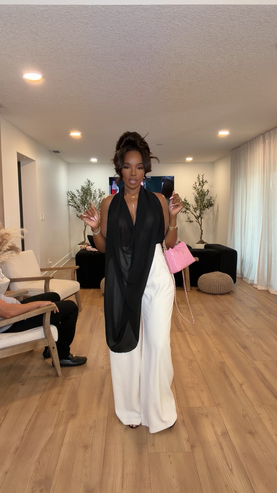 This outfit feels straight out of a luxury fashion campaign 🖤✨

The dramatic black draped top paired with the flowy white trousers creates such a timeless high-fashion contrast while still feeling effortless and wearable. Styled with the soft pink bag for the perfect pop that makes the whole look feel even more elevated.

Perfect for upscale dinners, vacation nights, cocktail events, fashion events, birthday dinners, and chic evening styling.

5’4 | 140LBS | 34D-27-40 | size small or 4

Black and white outfit, elevated evening look, classy wide leg trousers, luxury inspired fashion, elegant monochrome outfit, high fashion aesthetic, rich girl style, chic dinner outfit, sophisticated evening wear, timeless classy fashion, elevated vacation outfit, feminine luxury style

Follow me on Instagram and YouTube @kirasfashionfinds