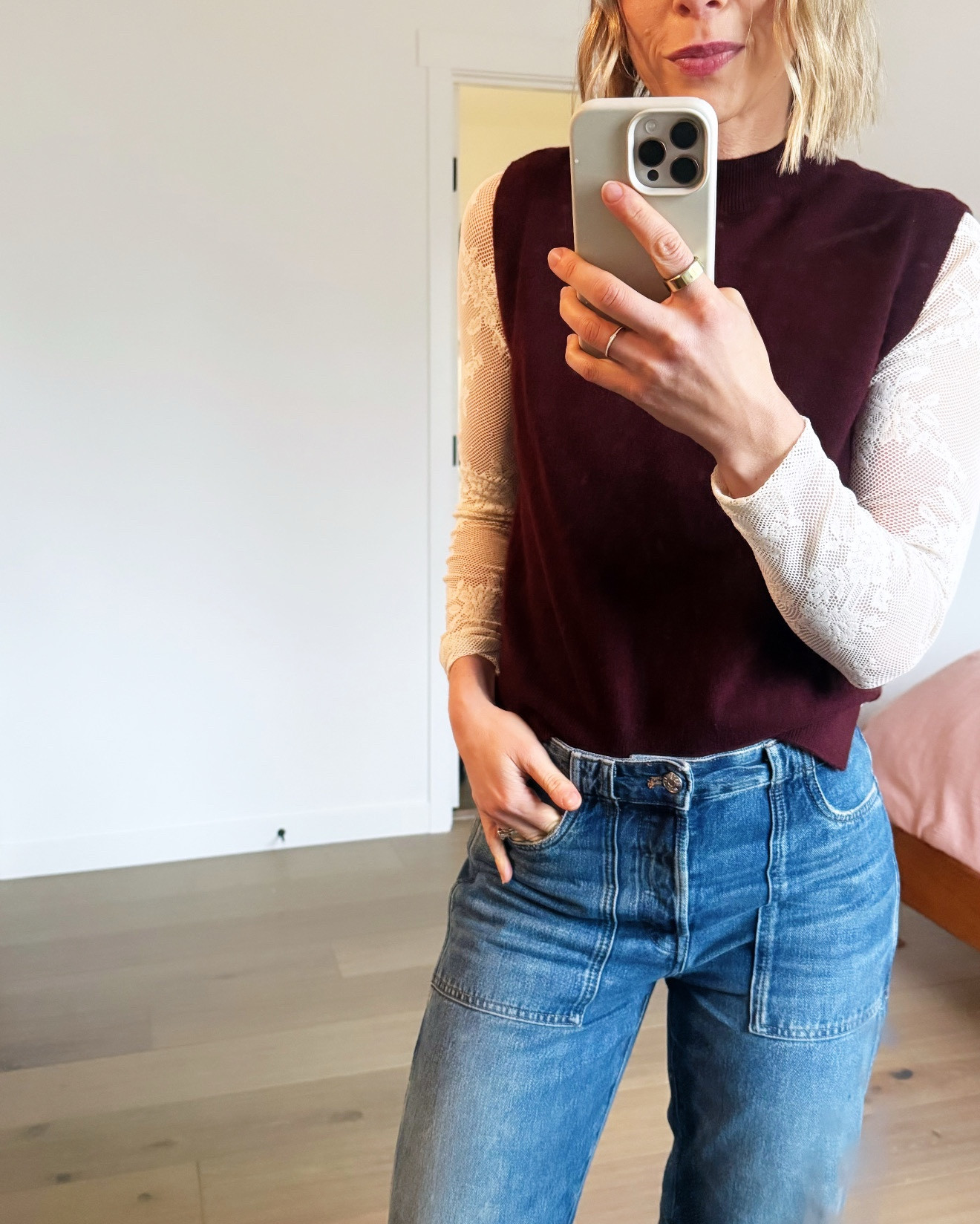 Loving this lace top. Perfect under sweaters or with a tank top underneath. I also love this cashmere vest and these sustainable barrel jeans are my fave! Wearing size 25 in jeans, small in both tops. 

#LTKGiftGuide