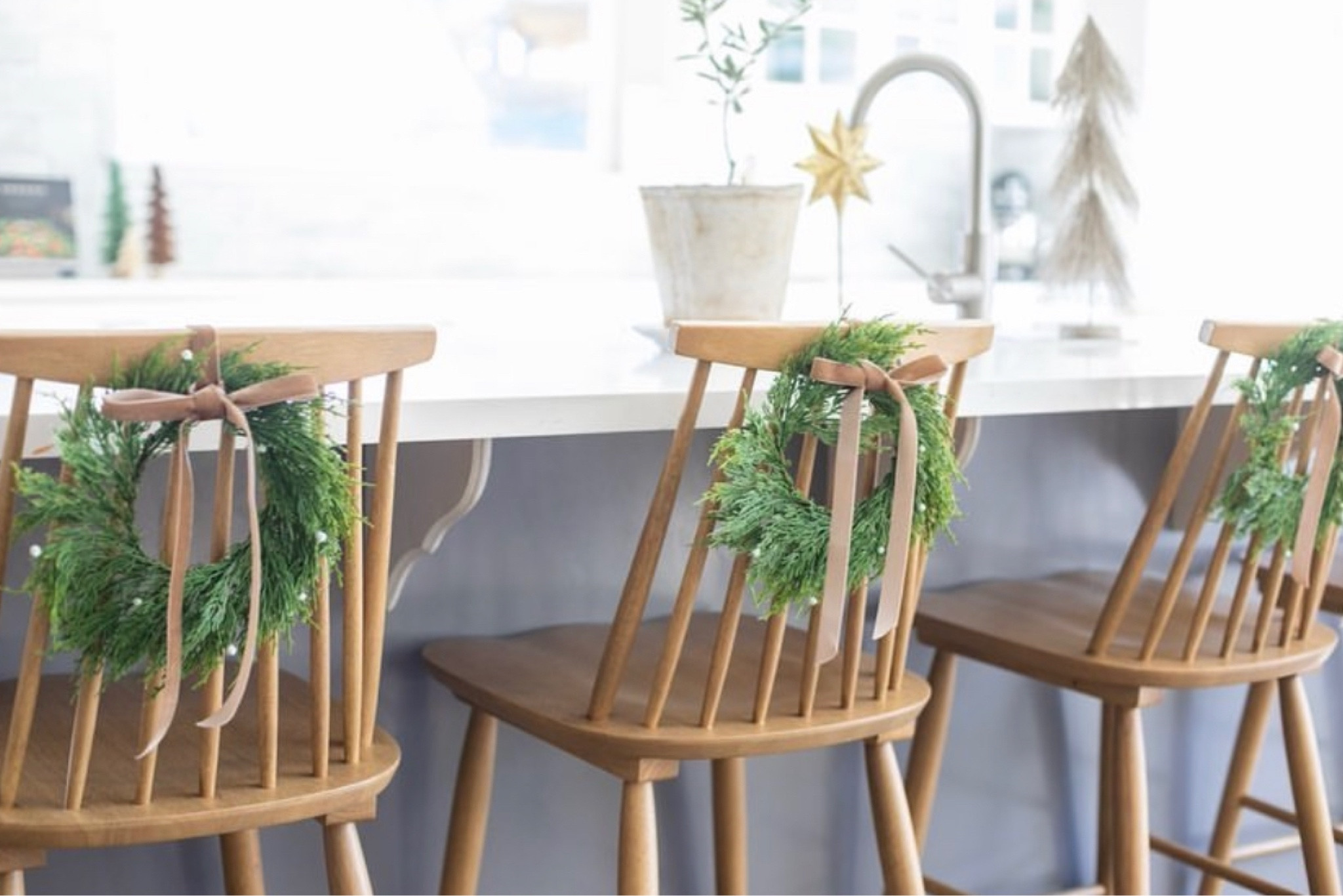 Add some Christmas cheer with small bar stool wreaths tied with a velvet. 

#LTKHoliday #LTKStyleTip #LTKHome