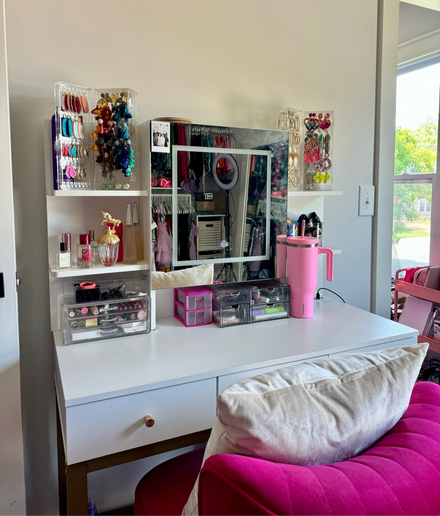 Feeling so organized now that I have my make up and work stations separated! This desk is so nice. I got it twice. The vanity has a built-in light and hidden storage behind the mirror. The shelving on the sides + built-in charging port is icing on the cake! It also comes with a matching seat, but I opted to add my hot pink chairs. everything is rounded up here for y’all!! 

#LTKHome #LTKSaleAlert #LTKWorkwear