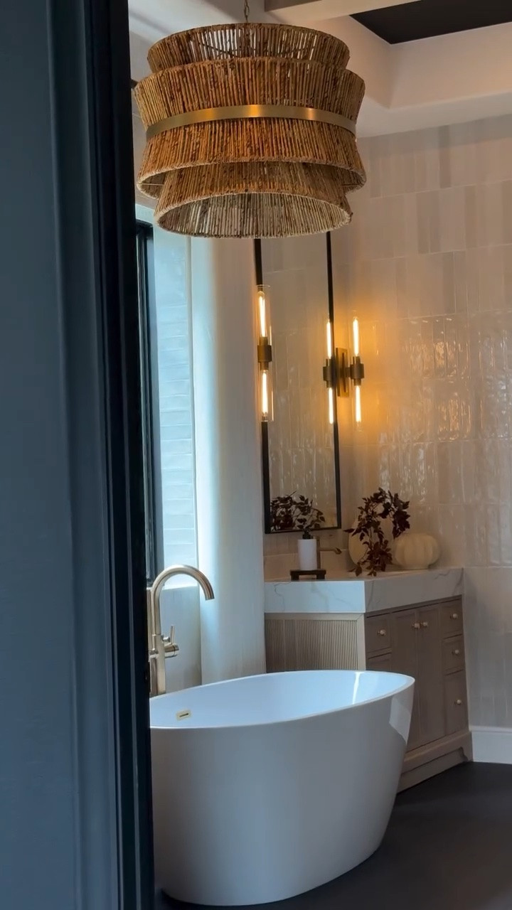 You can absolutely work with your builder grade framework to create a beautiful custom feel in your home. In this primary bathroom, I kept the original layout and framing, but updated the vanity, tub, flooring, and finishes to completely transform the space into something that feels elevated, warm, and much more personal.

Edit Inspo: @emm_interiors

🛒 Click the link below — all products are linked for easy purchase!

#LTKSaleAlert #LTKHome #LTKStyleTip #BathroomInspo #BathroomRemodel #BuilderGradeUpgrade #HomeRenovation #CustomLook #BathroomDesign #HomeMakeover #InteriorInspo #WarmHome