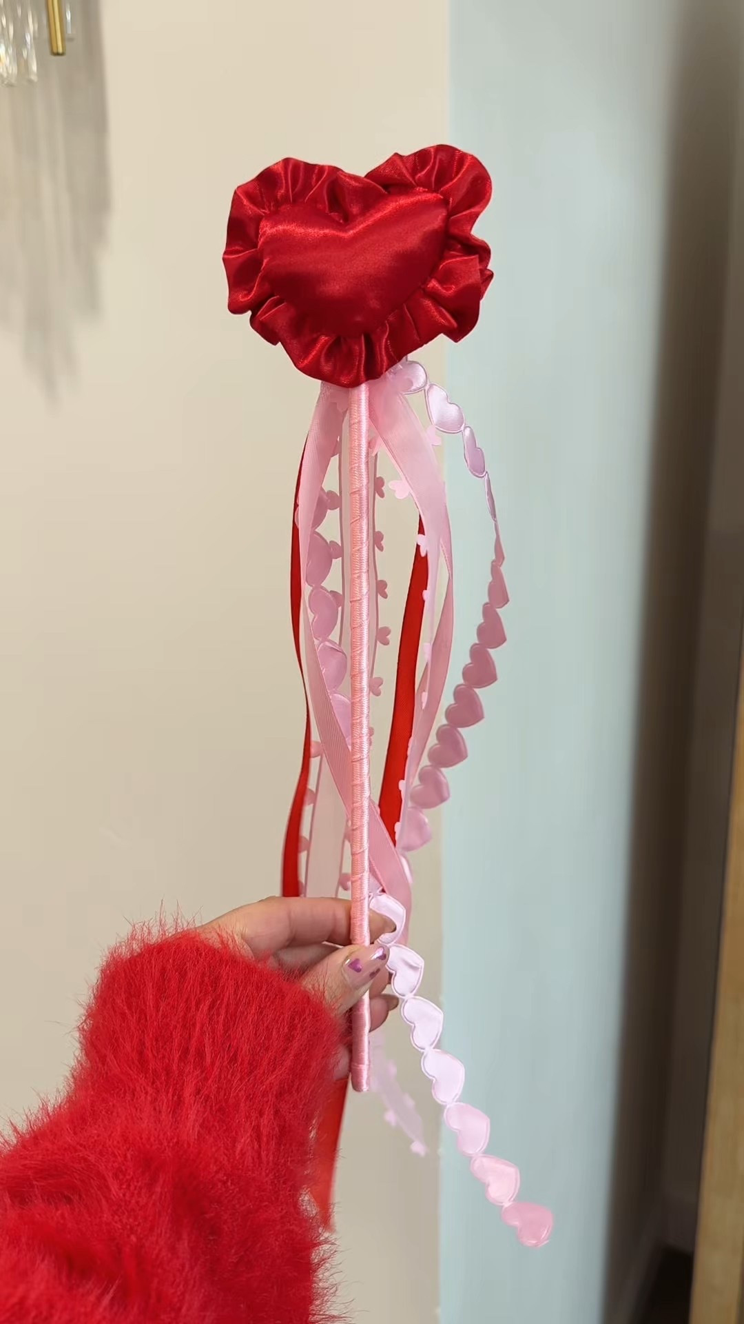Stopppp these might be my favorite Valentine DIY yet 💘✨ 

I found them for $20 online and thought, hmm maybe we can do better! 

I made the cutest heart wands and they were SO easy. I started with a large wooden dowel, wrapped the whole thing in ribbon with hot glue, then topped it with a  satin bowl-filler heart from Target. 

The best part? Adding all the different ribbons at different lengths so they trail and twirl when you wave them 😍🎀

Perfect for playtime, dress-up, Valentine baskets, or just a little extra magic around the house 💖

DIY • budget friendly • kid magic approved 💫