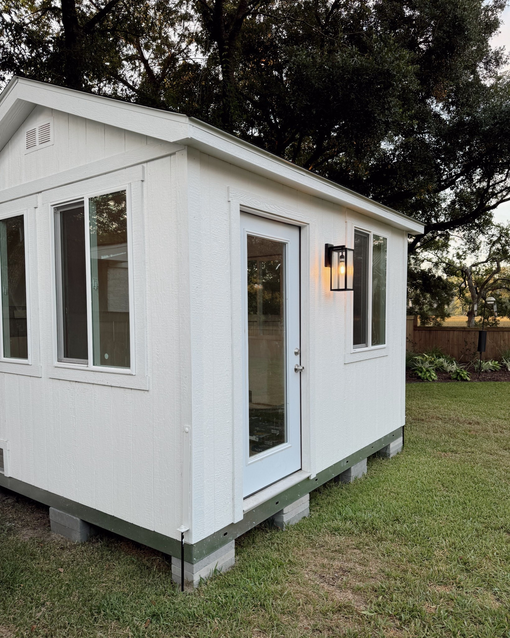 We added this wall sconce to our tiny office and I love how it completely elevated the exterior 🤍 It’s modern, minimal, and works indoors or out 

#LTKFindsUnder100 #LTKHome
