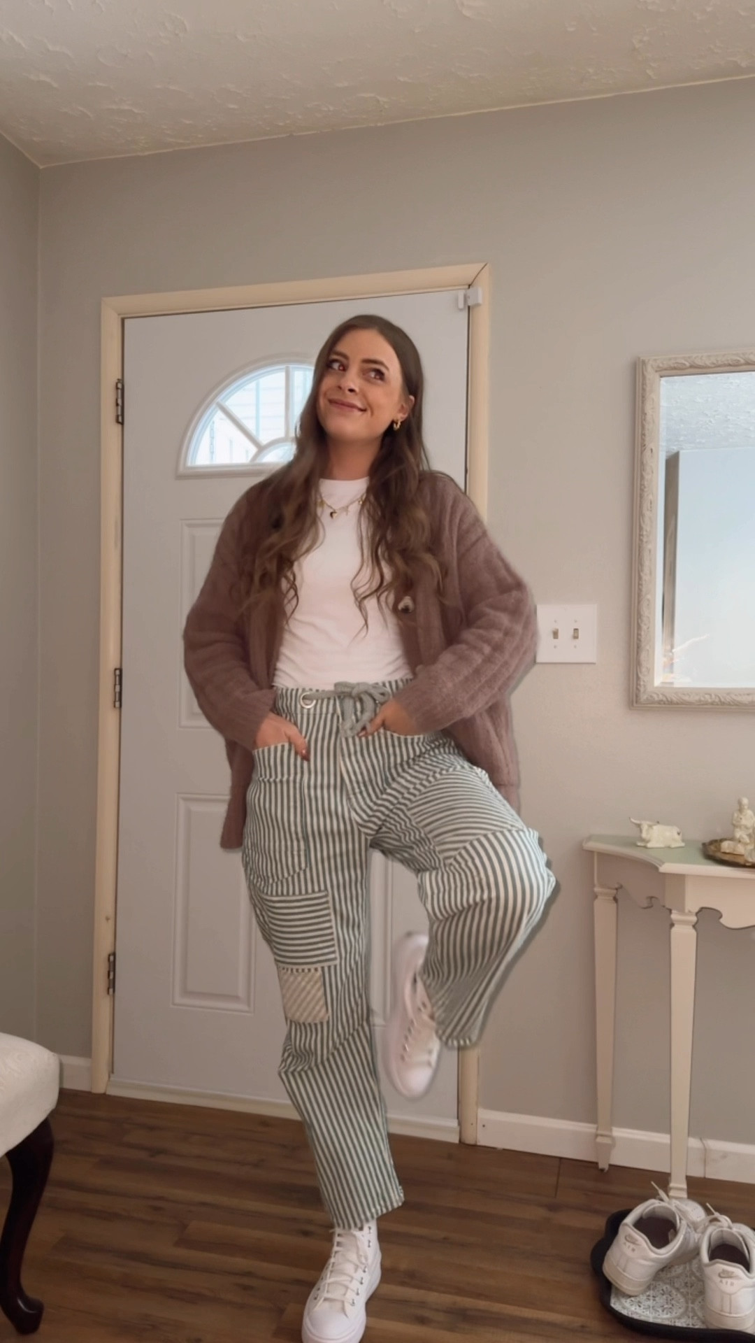 OOTD 1/15/25

White cropped baby tee, Abercrombie basics t-shirt, cozy comfy oversized cardigan, tortoiseshell buttons, mauve taupe cardigan sweater, stripe denim jeans, free people barrel jeans, fp denim, white platform high top converse, gold chunky jewelry, charm necklace, chunky gold hoops, ribbed headband, winter style, how to style winter outfits, long hair style, casual winter outfit ideas

#LTKShoeCrush #LTKSaleAlert #LTKStyleTip