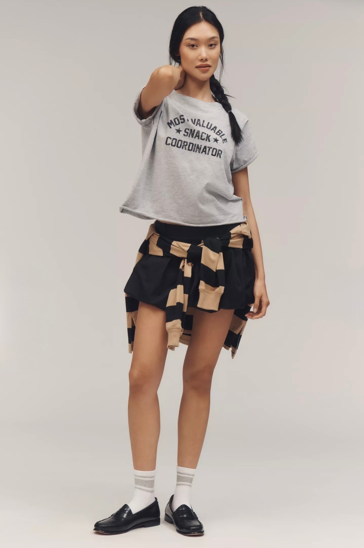 Very cute and casual top / tee with a nice detail details. Wearing size small  