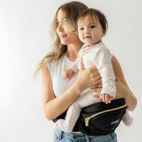 Tushbaby Original Hip Seat Baby Carrier for Babies & Toddlers up to 45 lbs, Safety Certified, Lightweight No-Foam Design with Storage & Nursing Support, Black & Gold | Amazon (US)