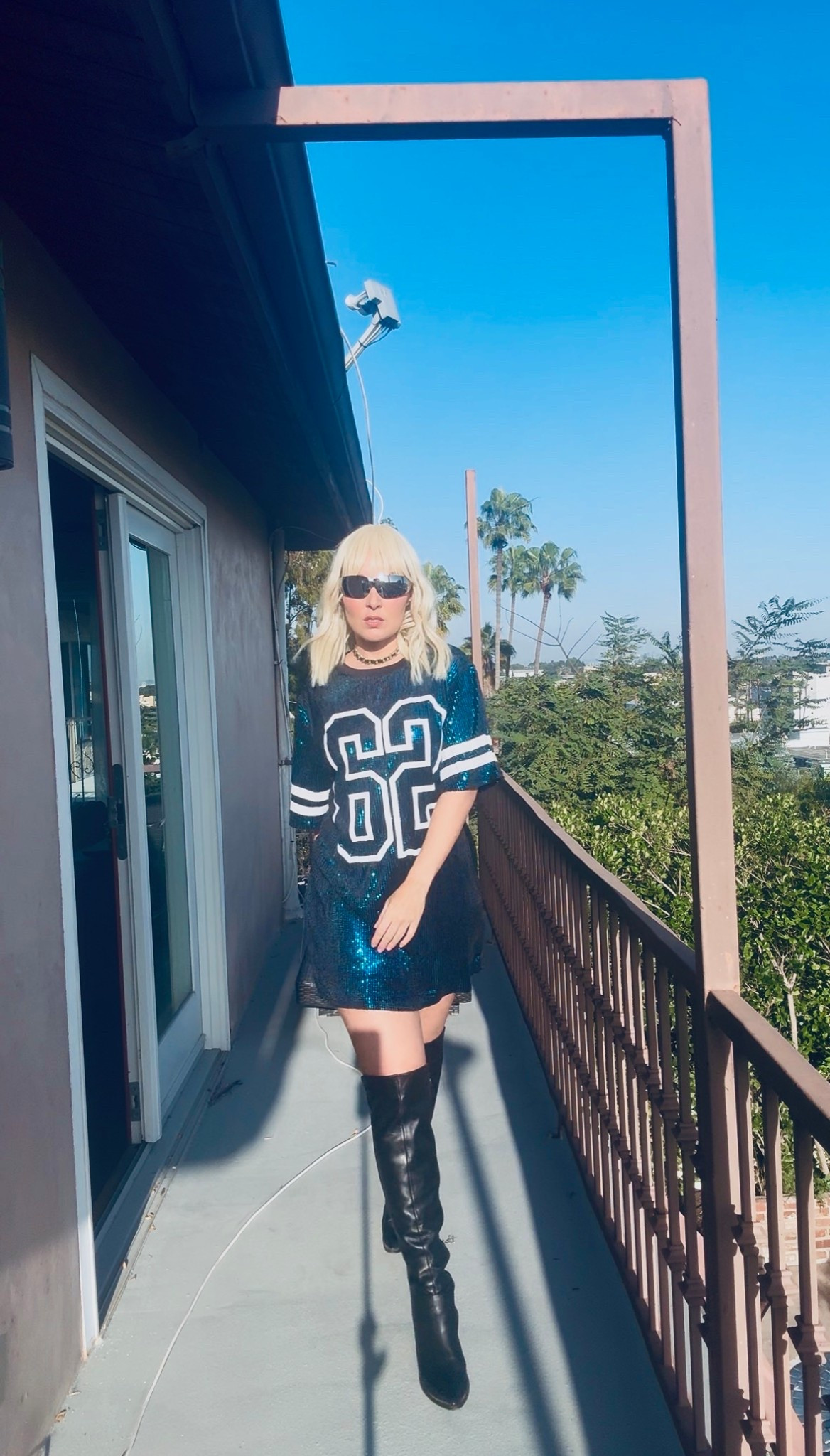 Rock a sporty look with some thigh high boots for game days

#sporty #artist #jersey #cute #athleticlook 

#LTKootd