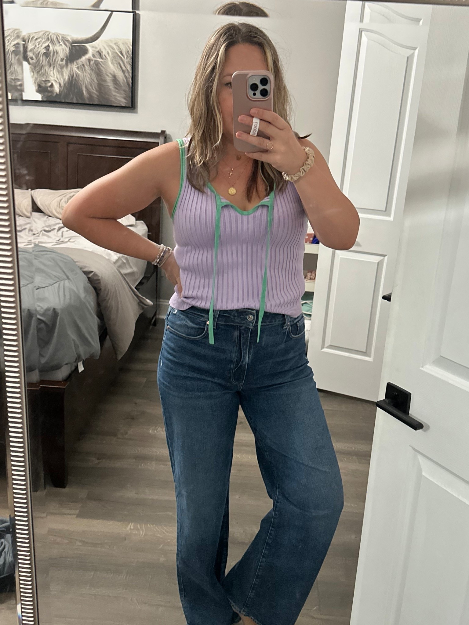 Free People sweater tank for the win! Perfectly cropped for high waist denim. True to size  

#LTKFindsUnder50 #LTKStyleTip #LTKSaleAlert