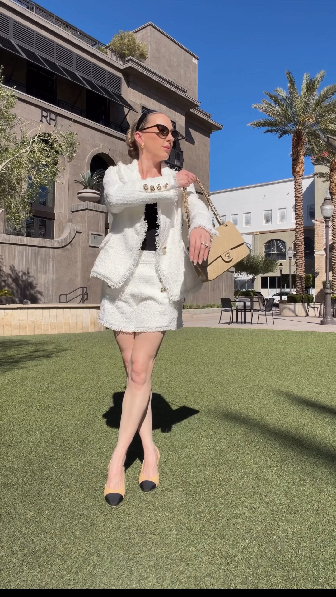 #ad The Noli Shop OOTD: how chic is this white tweed blazer and matching shorts set. It’s the gold buttons for me 👍 This is the kind of outfit that can take you from shopping to lunch to the boardroom. Styling with Chanel slingback heels, classic Chanel double flap bag and Dior headband. Expect to see a lot of headbands this season thanks to CBK. #cbkstyle #ootd #springoutfit

#LTKWorkwear #LTKootd #LTKSeasonal