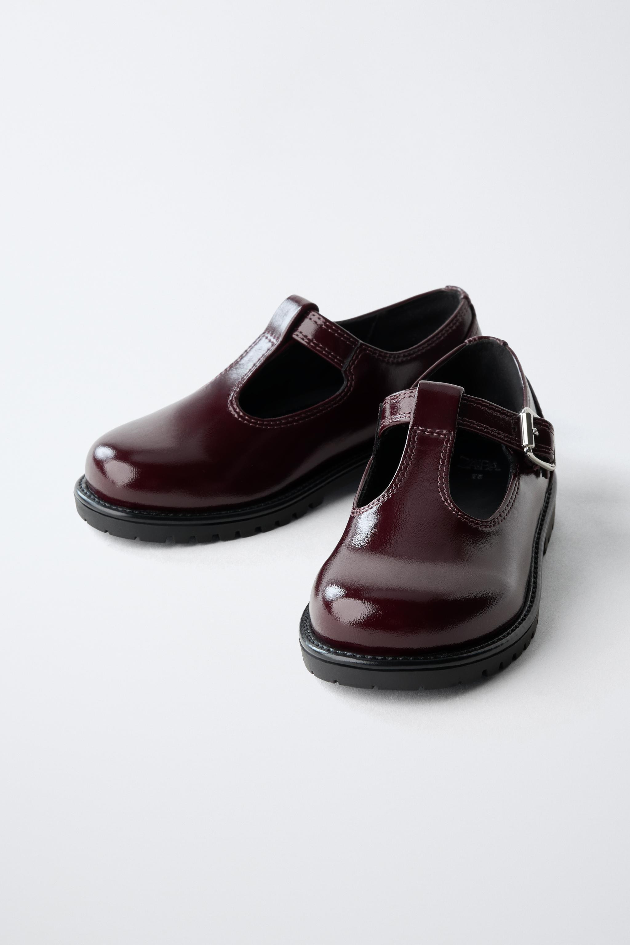 T-strap ballet flats with cut-out details on the instep. Features side buckle closure and a chunk... | Zara US