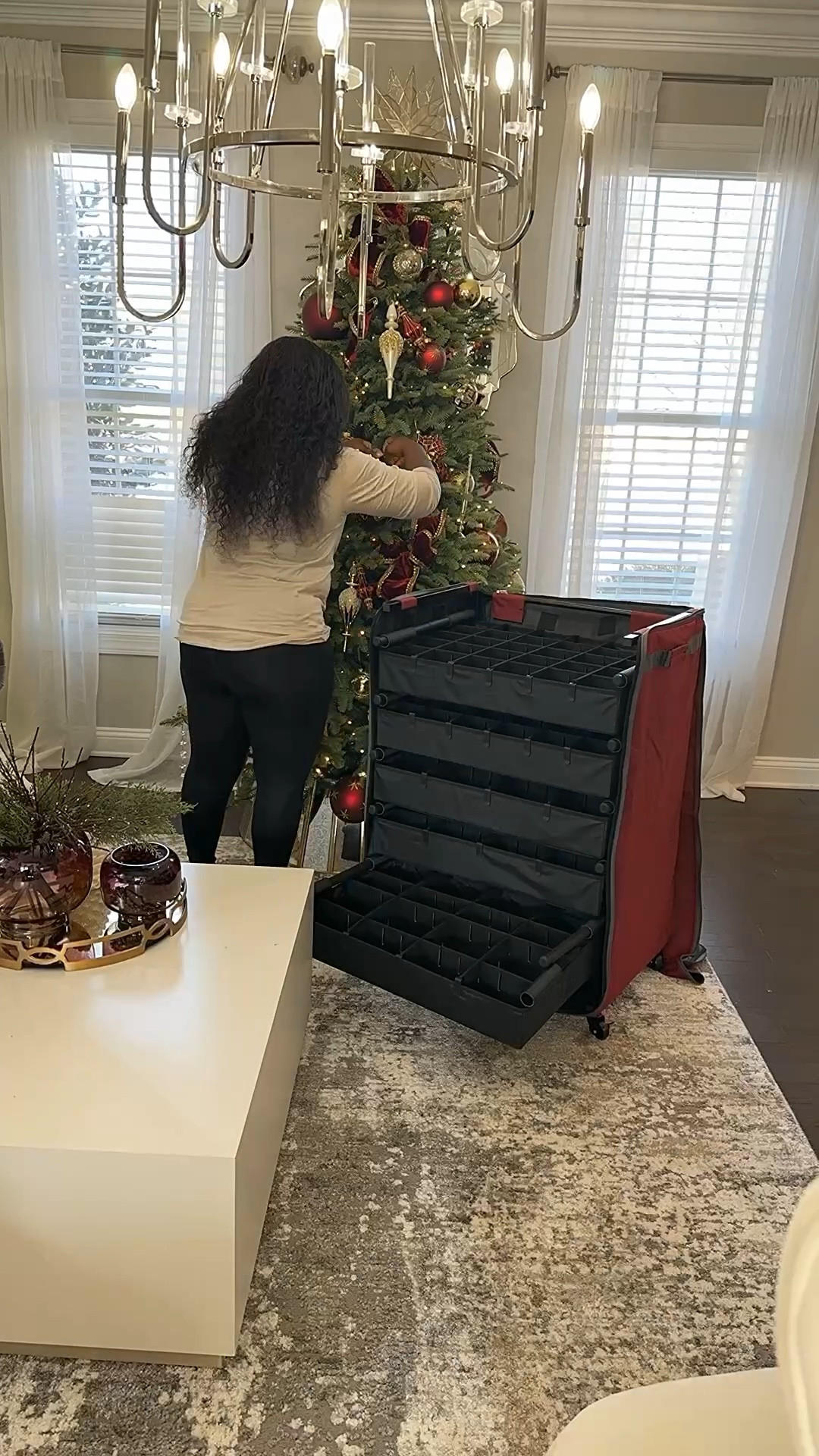 Bye bye Christmas decor ✌🏾 I’m officially ready for a reset 😅 Have you taken yours down yet? One space done, three more to go. This flip tree made takedown so easy, and this ornament storage chest is honestly a win, great for glass pieces👌🏾

#LTKSeasonal #LTKSaleAlert #LTKHome