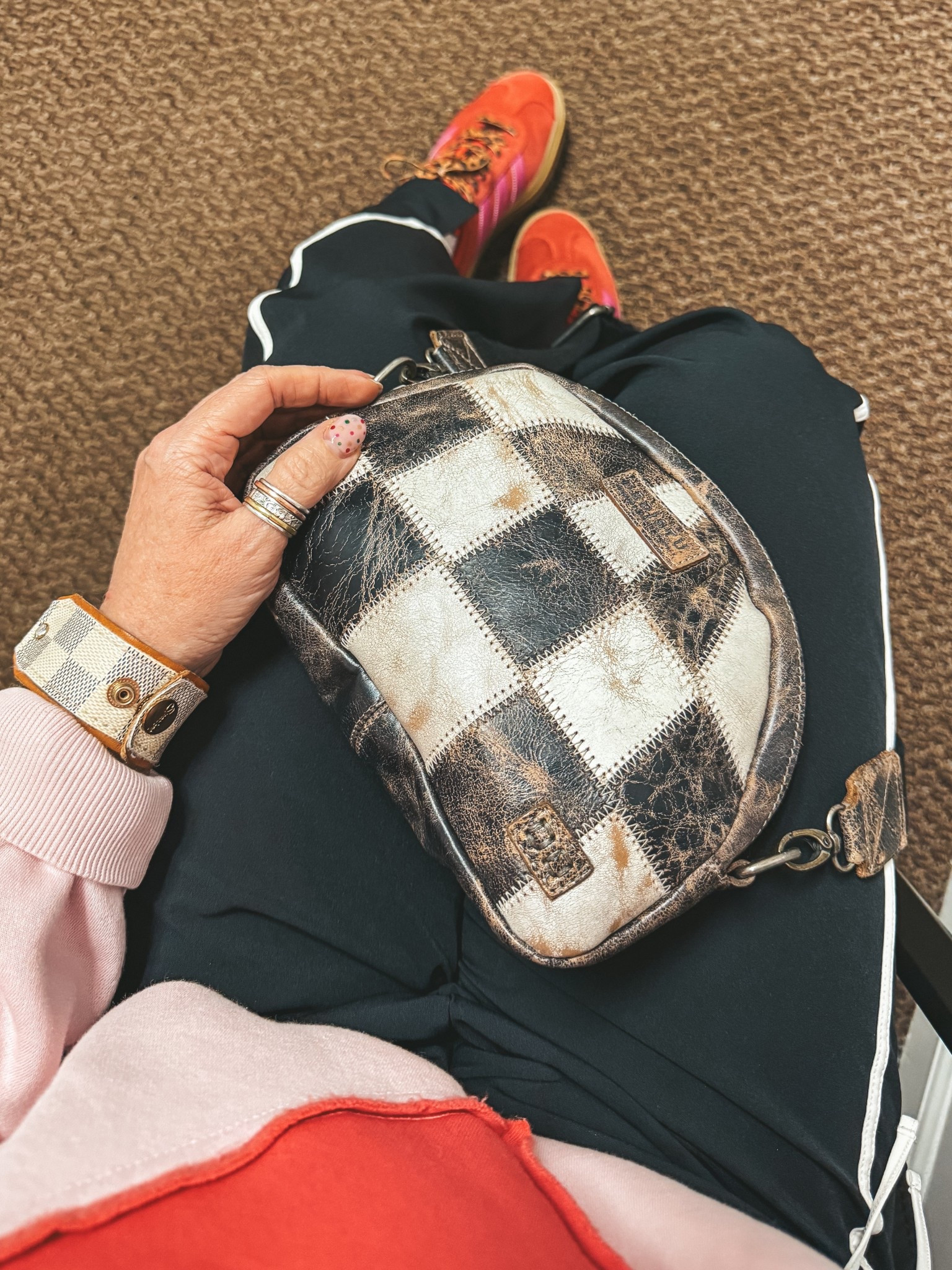 I LOVE this checkered bag! It’s so fun and these pants are the cutest!! I’m in a medium  

#LTKootd #LTKActive #LTKOver40