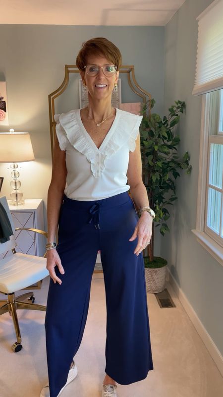 New in from Gibsonlook! Wearing this very cute mixed media ruffle collar top in a small paired with navy blue ponte knit wide leg pants in a large. These pants are so good! I may never take them off!

Hi I’m Suzanne from A Tall Drink of Style - I am 6’1”. I have a 36” inseam. I wear a medium in most tops, an 8 or a 10 in most bottoms, an 8 in most dresses, and a size 9 shoe. 

Over 50 fashion, tall fashion, workwear, everyday, timeless, Classic Outfits

fashion for women over 50, tall fashion, smart casual, work outfit, workwear, timeless classic outfits, timeless classic style, classic fashion, jeans, date night outfit, dress, spring outfit, jumpsuit, wedding guest dress, white dress, sandals

#LTKActive #LTKOver40 #LTKFindsUnder100