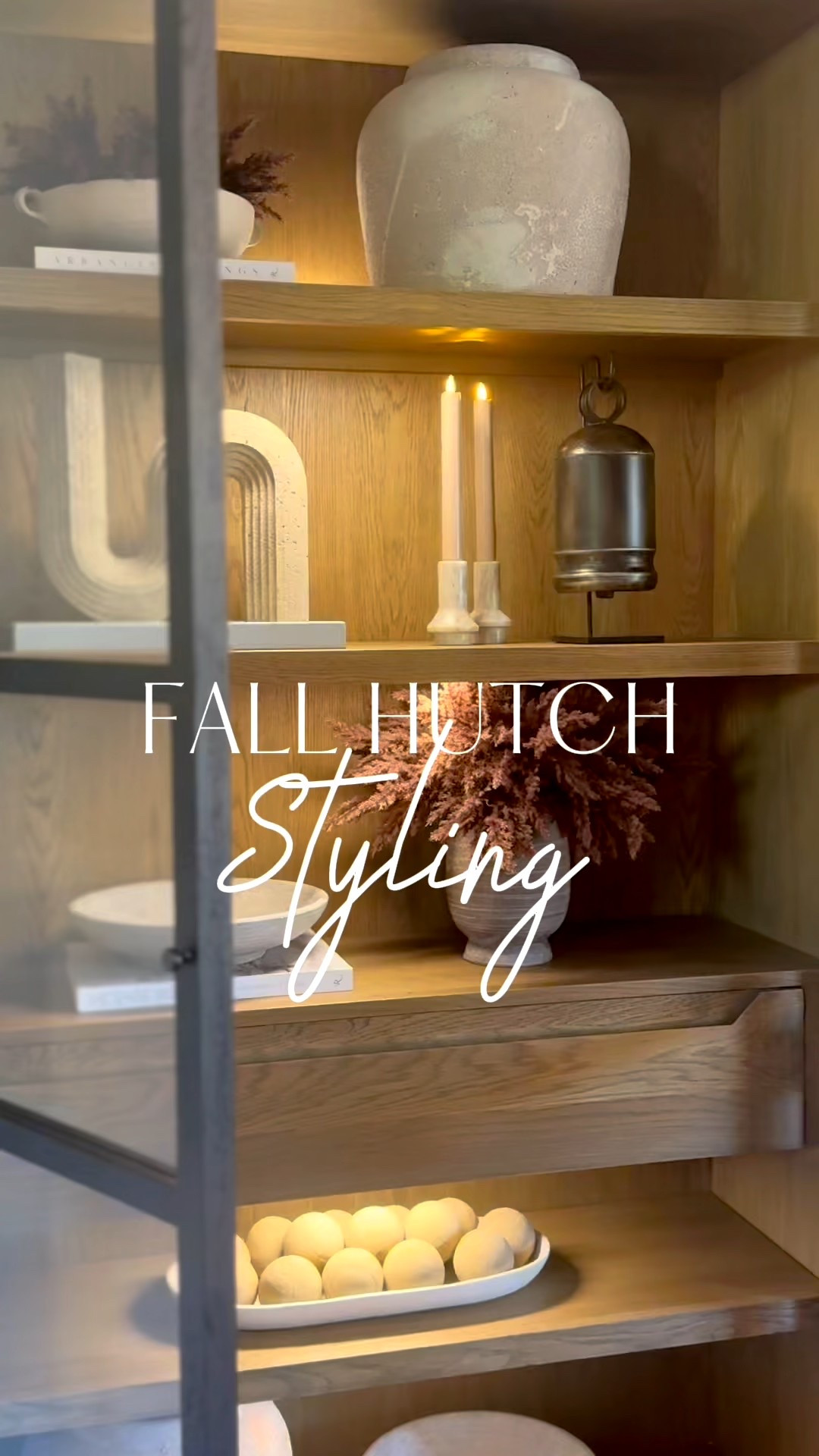 Styling the hutch for fall 🤎 I added my favorite wireless lights under each shelf, and it gives the prettiest glow at night. Keeping it cozy and neutral for the season! 🍂

#hutchstyling #hutch #falldecor #fallhomedecor #neutralhomedecor
 

#LTKFindsUnder50 #LTKFindsUnder100 #LTKHome #LTKHome #LTKU