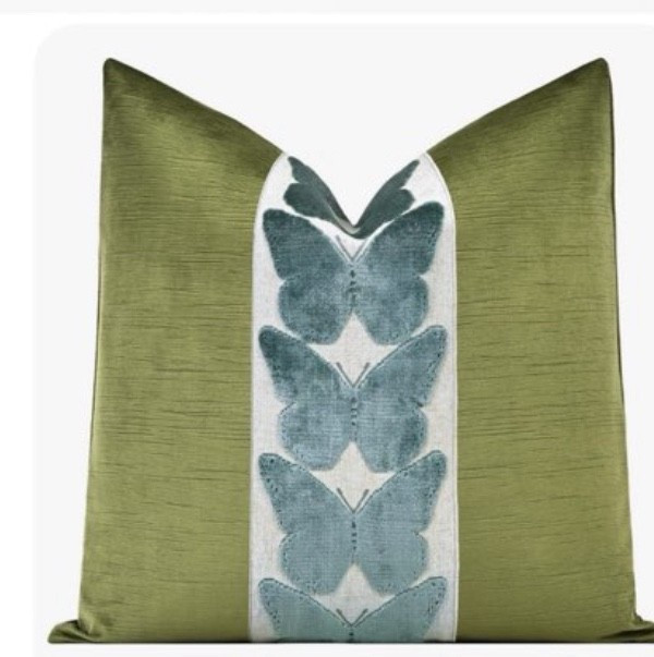 Fun pillow that is a Grandmillenial style yet could totally fit in a traditional style home 