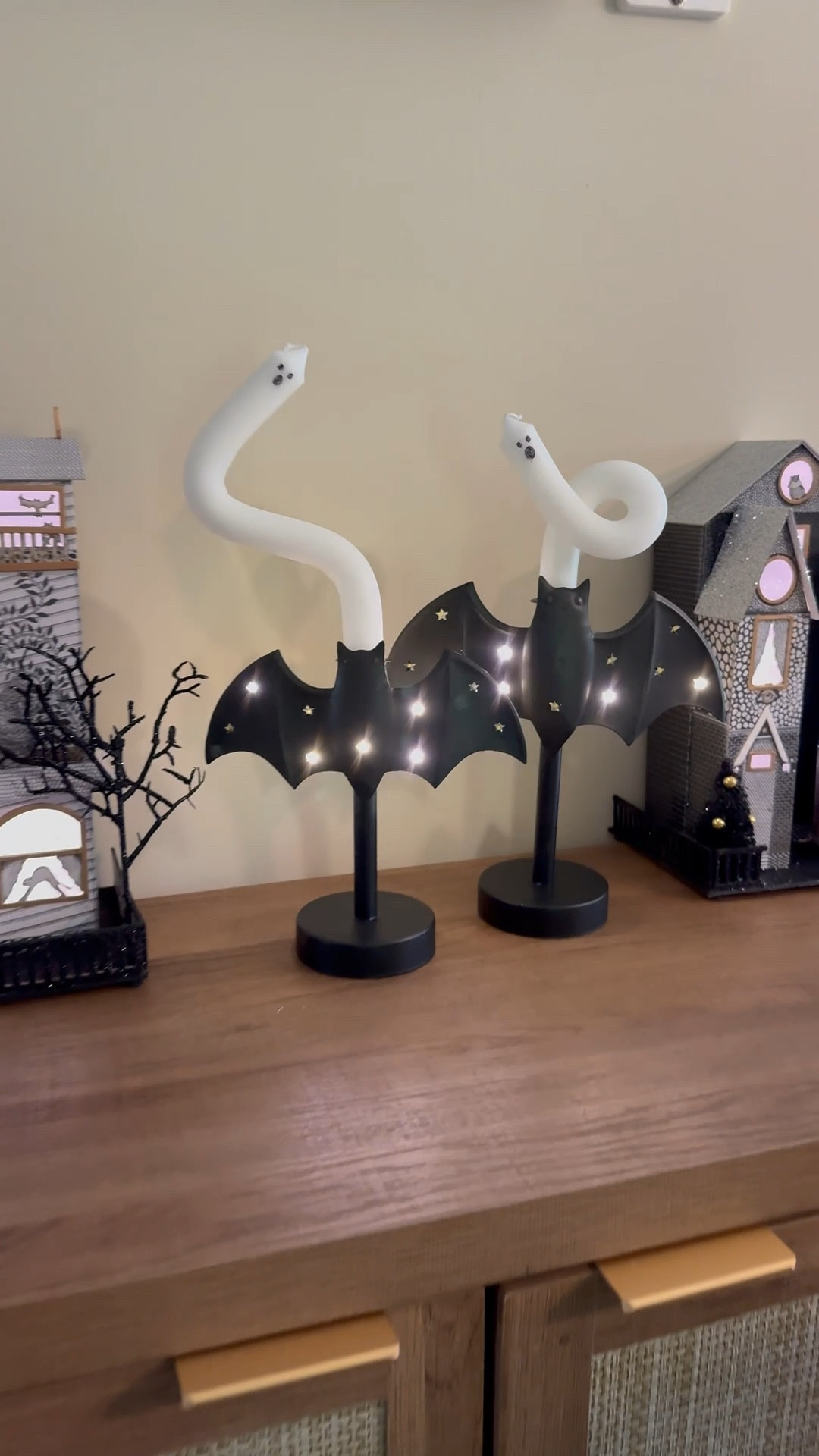 I am over the moon about these twinkling bat candle holders! I added some of my favorite DIY ghost candles and paired them with my new haunted houses to make this spooky-glam scene! 

#LTKFindsUnder100 #LTKSeasonal #LTKHome