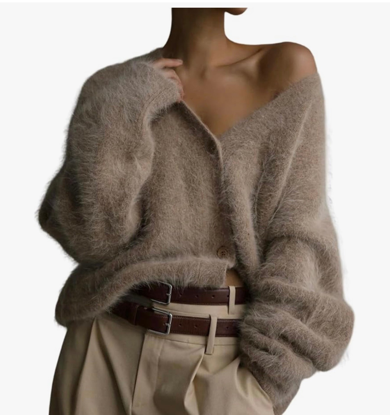 For reference I'm 5'3 130lbs and I'm wearing a size small. It fits oversized which I love! Feels like Mohair which is considered a luxury fiber due to its softness, luster, and durability, often used in high-end clothing. But this sweater here feels luxurious and is so affordable and sooooo buttery soft. 