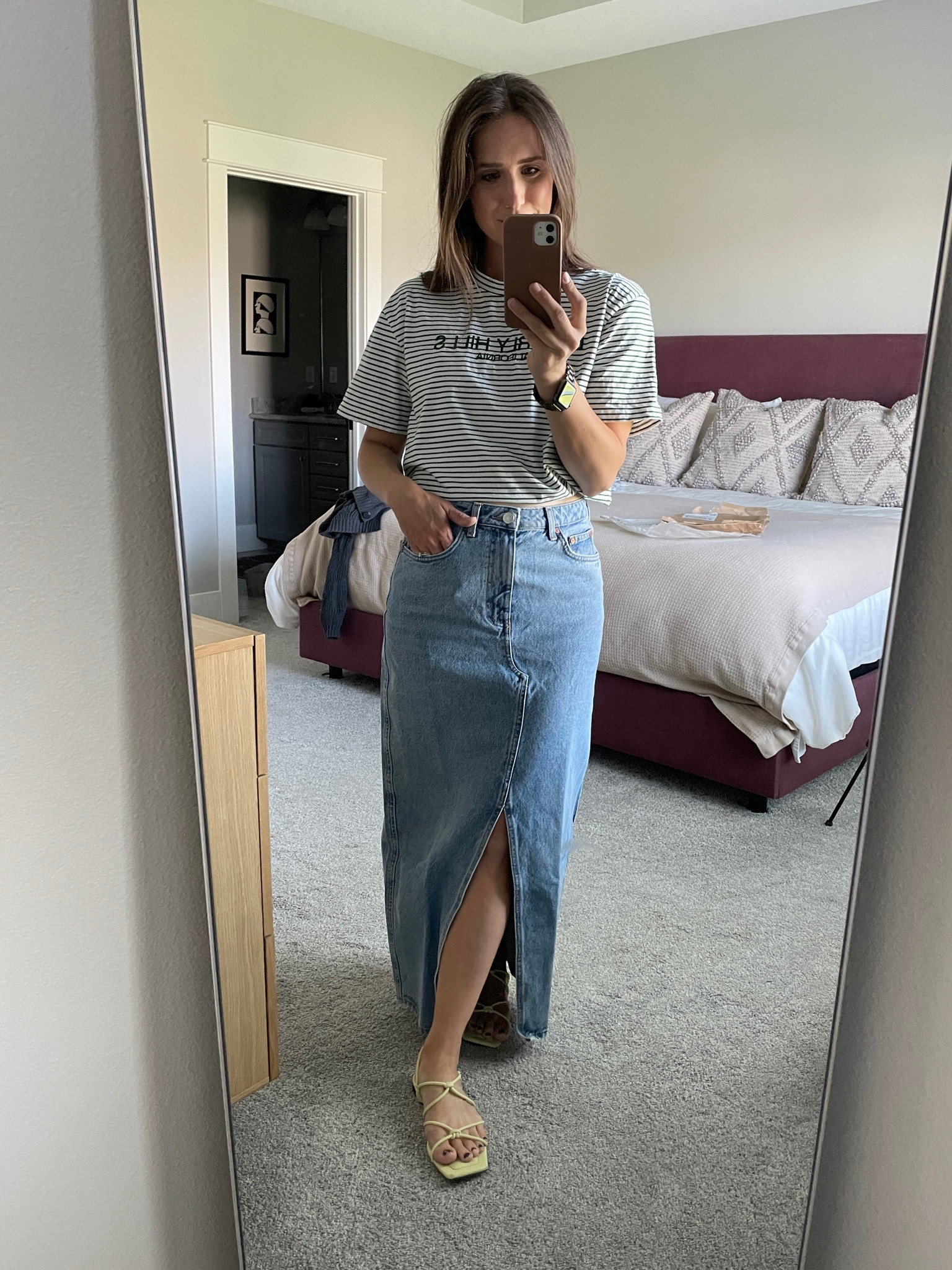 Long denim skirt under $100 from Mango. Fits true to size. I’m 5’5” & it’s the perfect maxi length without dragging on the ground. #denimskirt #jeanskirt #summeroutfit #graphictee 

#LTKFind #LTKU #LTKunder100
