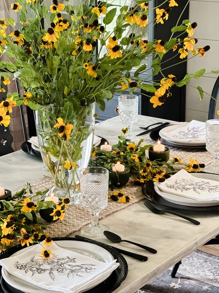 Simple Spring Tablescape! Inspired by nature and keeping things simple for this Spring Tablescape! Love the pop of color from these black-eyed Susans! P.S. Please know I’m very conscious of saving as many wildflowers as possible for the pollinators 🐝 These were going to be sprayed on agricultural land soon so it was basically a rescue mission 😅 We’ve slacked on mowing our lawn this Spring to help out as many 🐝 as possible!!! I’m a huge honey lover 🍯 so I do all that I can to help!! 

#cottagesandbungalows #southernlivingmag #americanfarmhouse #cottagestyle #countrylivingmag #betterhomesandgardens #mybhg #returninggracedesigns  #americanfarmhousestyle
#vintagefarmhouse #vintagestyle #viralreels #fixerupperstyle #cottagestyle 
#targetstyle #studiomcgee #magnolianetwork #neutraldecor #countrysamplerfarmhousestyle #countrysamplermagazine #fleamarketdecor #springdecorating #springdiningroom #springnapkins #cblovesspringflowers 

#LTKhome #LTKSeasonal