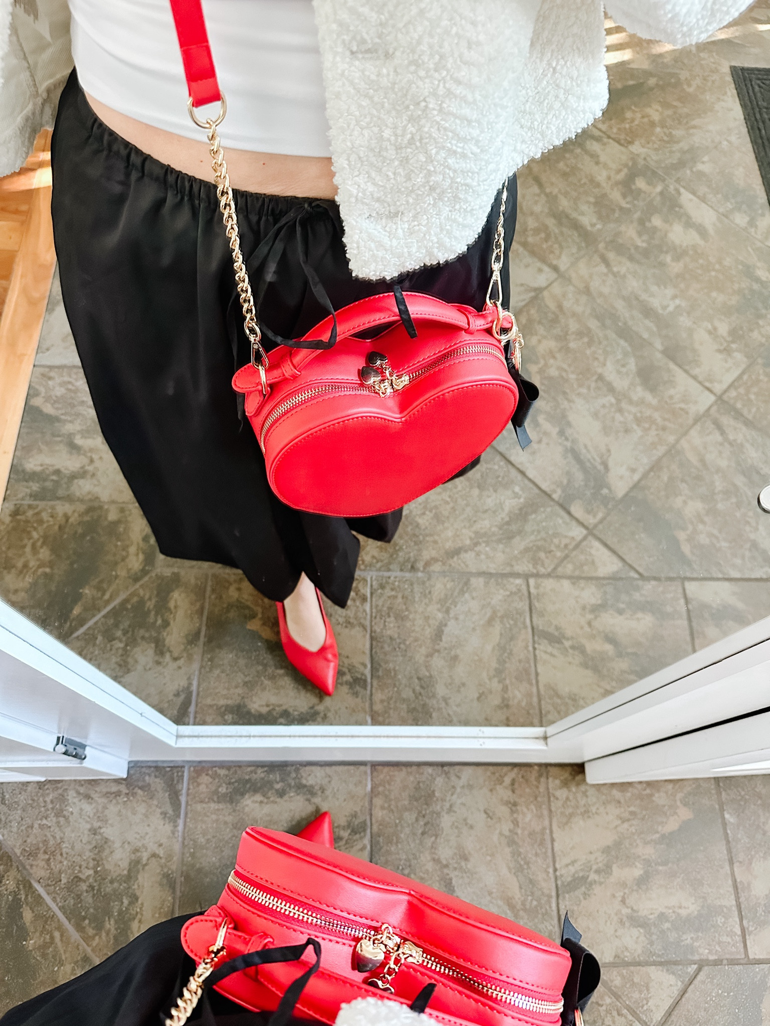 Heart purse 

#LTKautumn #LTKcanada #LTKbag