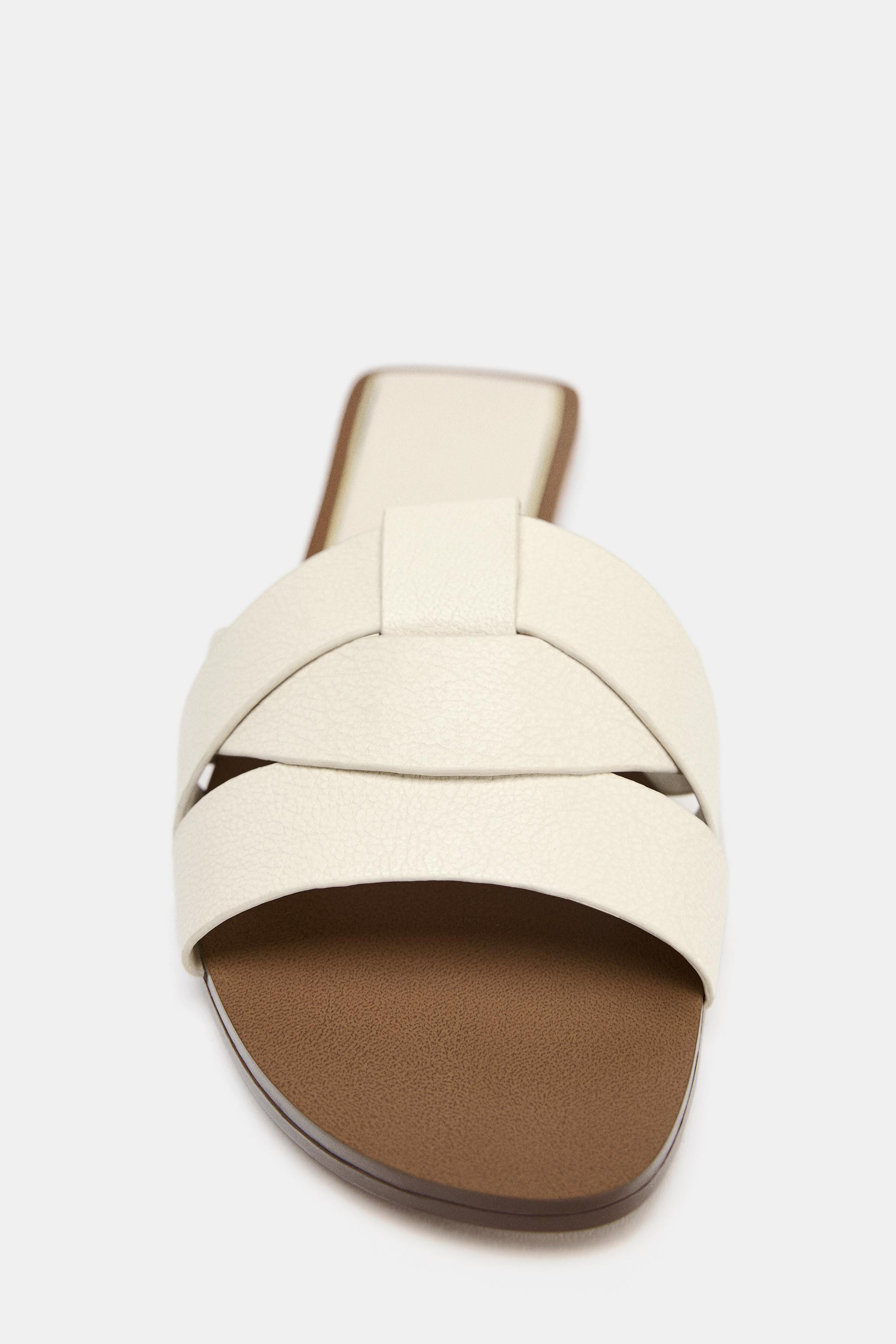 FLAT CROSSED LEATHER SANDALS | Zara US
