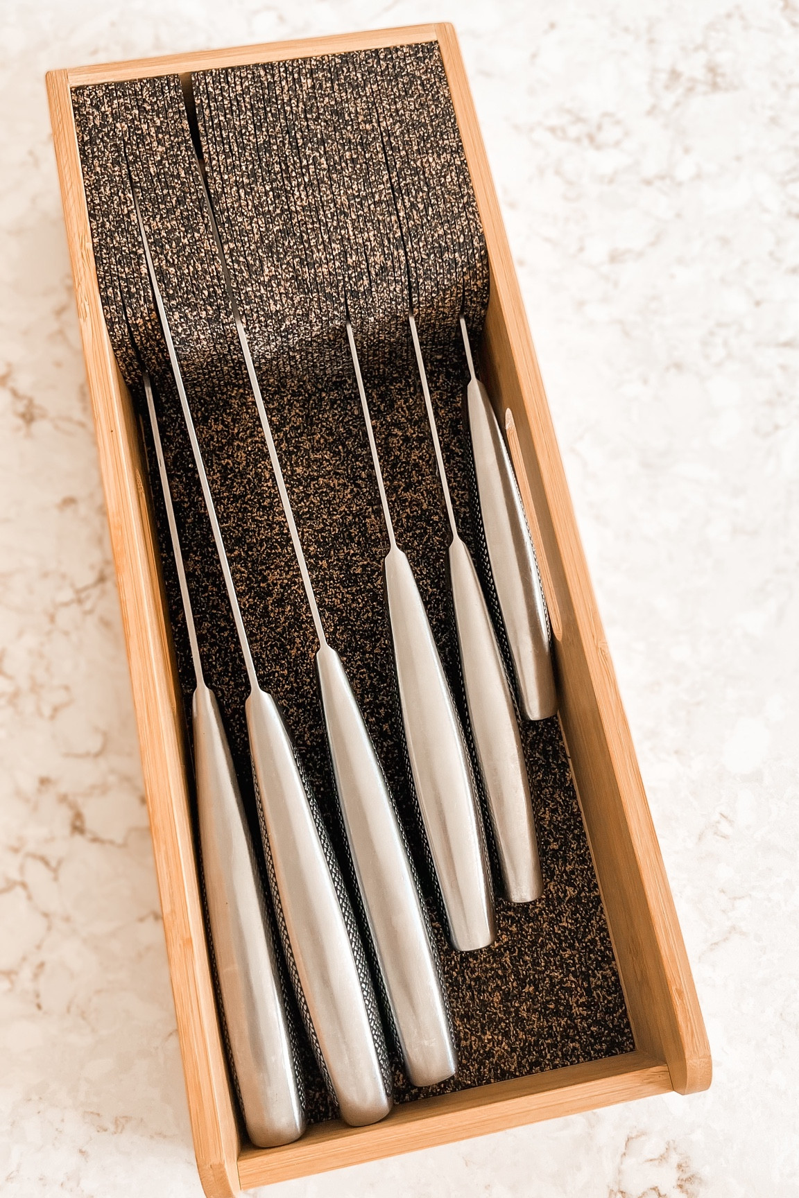 I hate storing my knives on my counter and have been looking for a solution to organize my knife drawer and this is it! The flexible dividers help to organize all my different size knives and love the natural look of the bamboo.  

#kitchenorganization #amazon #amazonorganization

#LTKfindsunder50 #LTKfamily #LTKhome