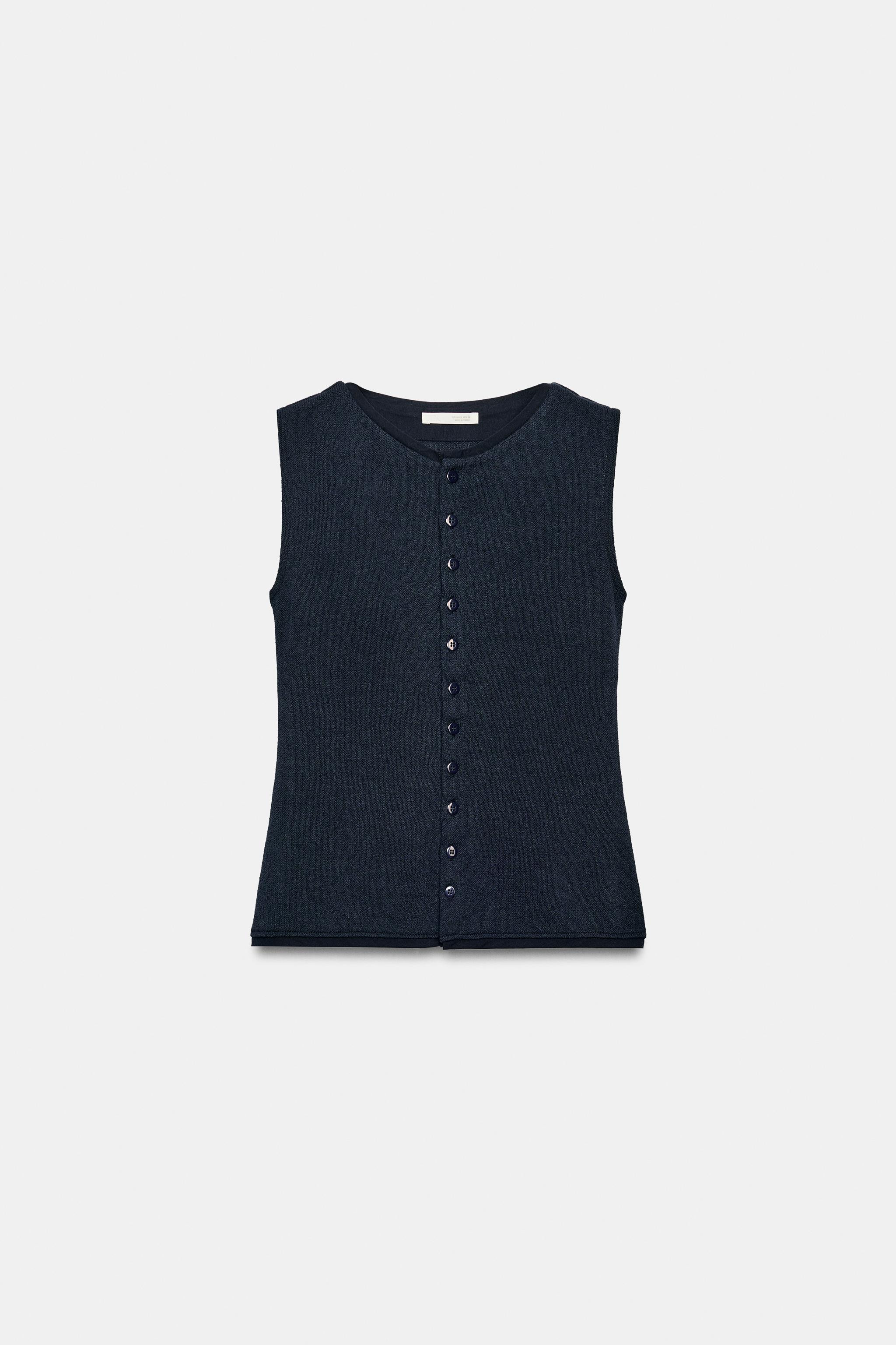 Model height: 173 cmWaistcoat made from a viscose blend yarn. Featuring a round neck and sleevele... | Zara UK