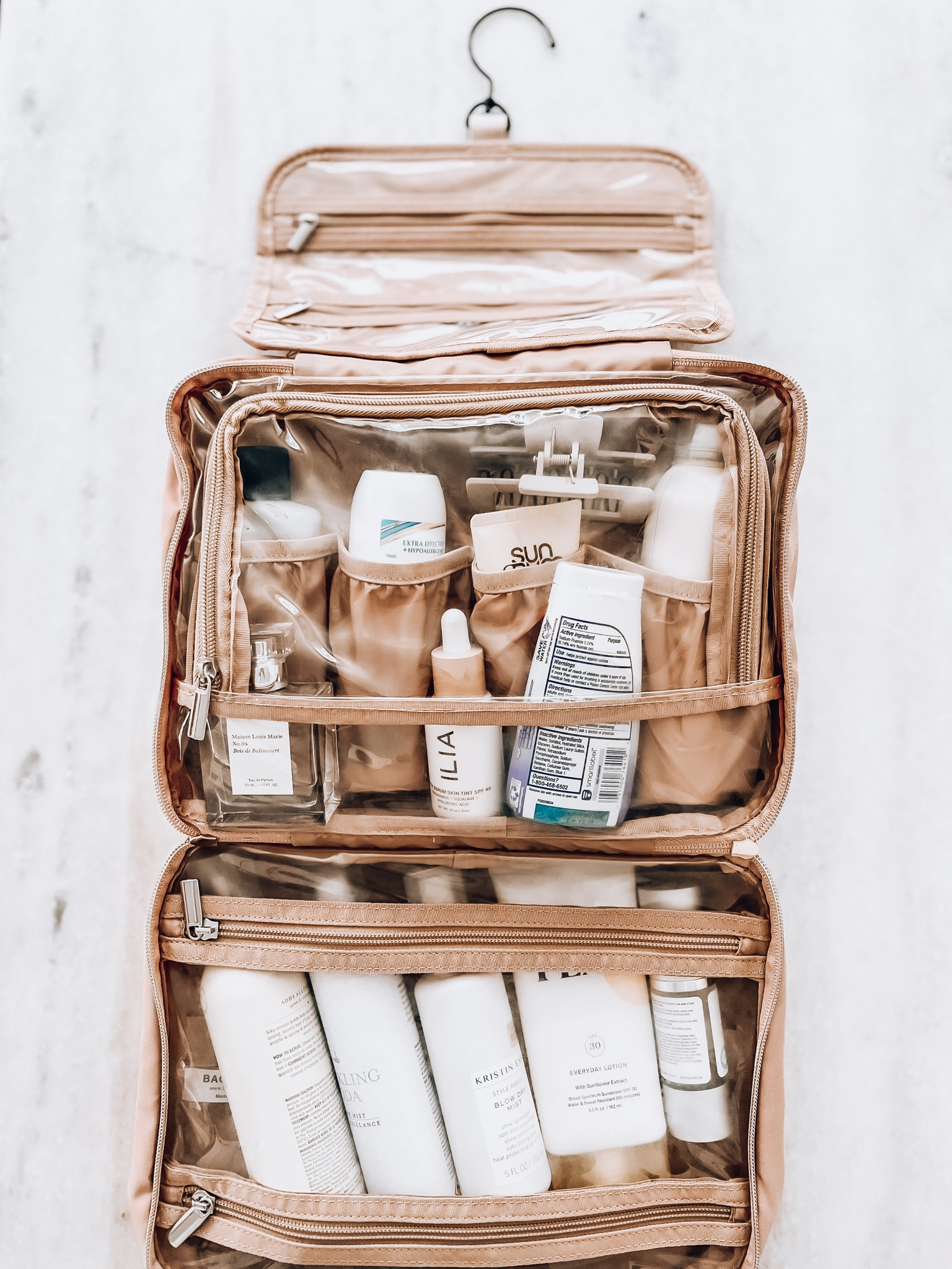 BAGSMART Toiletry Bag Hanging Travel Makeup Organizer with TSA Approved Transparent Cosmetic Bag Makeup Bag for Full Sized Toiletries 

Convenient Design - Stow-away 360 degree swivel non-slip metal hook for versatile hanging options; Carry handle doubles as its hanging strap; Two-way zipper closure for quick access
Interior Design-Inner main pockets with elastic straps hold bottles upright; Double zipper compartment for easy access the items even not full-opened the bag; Transparent sides for providing clear overview of contents.

#LTKsalealert #LTKxPrimeDay #LTKitbag