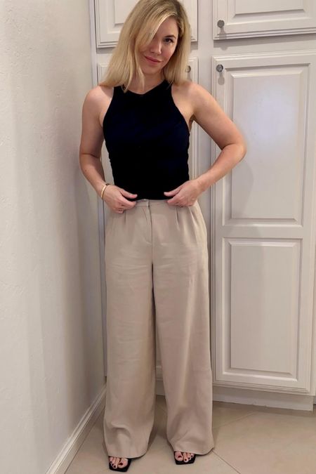  Black top
Pleated pants 

Resort wear
Vacation outfit
Date night outfit
Spring outfit
#Itkseasonal
#Itkover40
#Itku


#LTKworkwear #LTKfindsunder100 #LTKfindsunder50