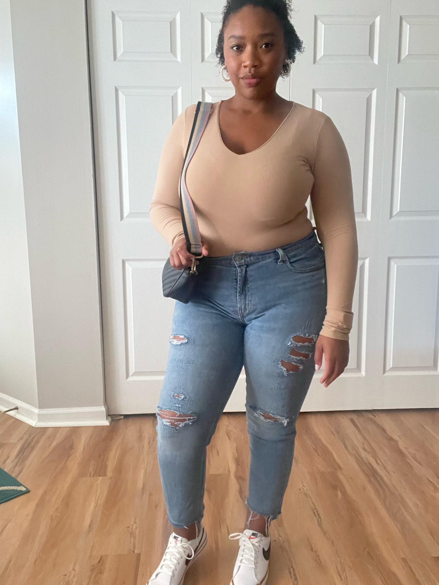 This bodysuit is so soft and comfy. Love the black and tan details on these shoes 
Bodysuit- Pink Lily
Jeans-Old Navy
Shoes- Nike Legacy

#LTKshoecrush #LTKstyletip