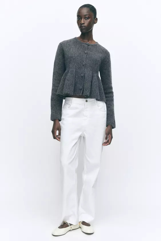 Round neck, long sleeve jacket. Flared hem. Matching covered button front closure. | Zara US