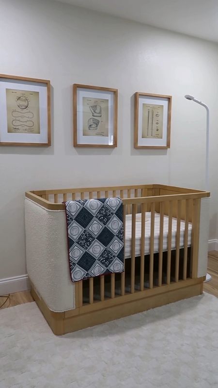 Retro baseball nursery. Boucle crib, automatic recliner, and chest of drawers changing table, hatch changing pad smart scale, retro baseball prints, coordinating natural wood framed with white matting, extra soft washable rug, Nanit floor baby monitor, custom mobile, breathable mattress, and more 

#LTKhome #LTKbaby #LTKbump