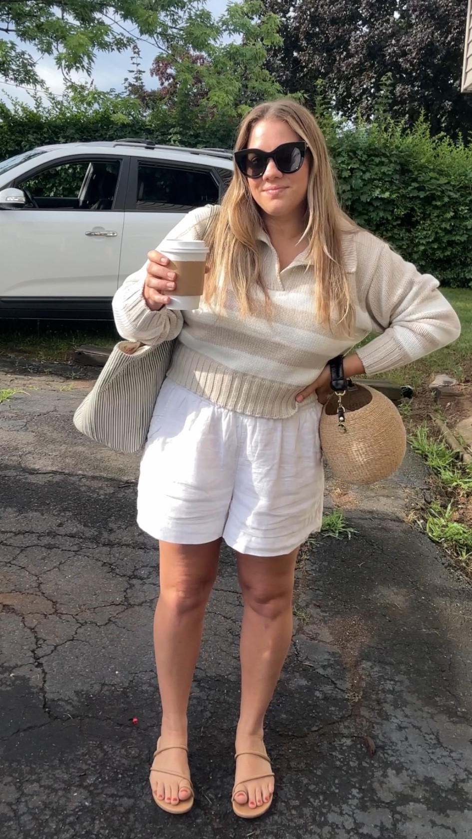 Sweater runs true to size - a little shorter style but loosens nicely and falls a bit ! 

Im in a medium regular
 tropez short length ( see exact product link below)

Shorts run roomy- im in a medium- BEST LINED WHITE LINEN shorts

Also come in longer inseam option! 