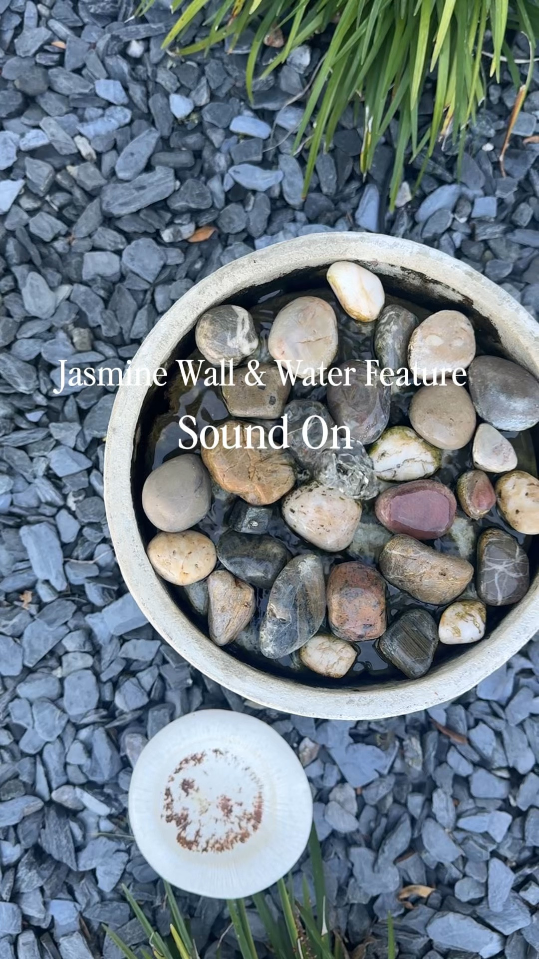 I knew that the front of our house needed a little bit of character and this white empty wall was screaming a jasmine trellis in my head. I also knew I wanted the entrance to bring a coastal calmness when people came over so a little water feature in the front was also on my vision board. I was able to pick up this fountain on Wayfair last year and it has done the job perfectly. It’s made out of 100% cement so I know it’s going to stand the test of time through Florida hurricanes! All we did was pick up a timer and we enjoy this peace and tranquility out front of our house from 8 AM to 5 PM. I’ve linked our fountain, timer, and all the tools we used to build our jasmine wall.  

I did so much research for this jasmine wall. It’s very important that you don’t buy a trellis kit from Amazon because you need the eye hooks to be at least 2 inches away from the wall to allow the jasmine to breathe.