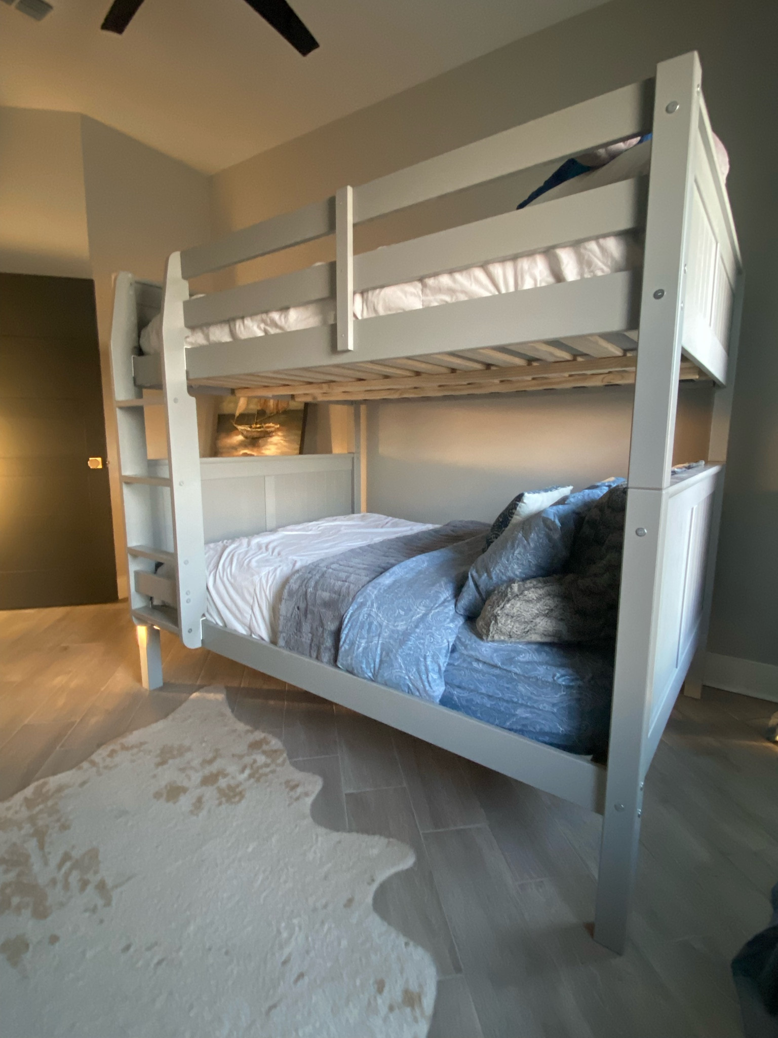 Full over full bunk bed in gray. Perfect for a boy or girl bedroom and sleepovers. 

Bed frame, bunk bed, bedroom style, cowhide rug, area rug, doorknob, octagon door knob in brushed gold finish. Emtek doorknob. Bedroom, guest bedroom, spare bedroom, kids bedroom  

#LTKkids #LTKfamily #LTKhome