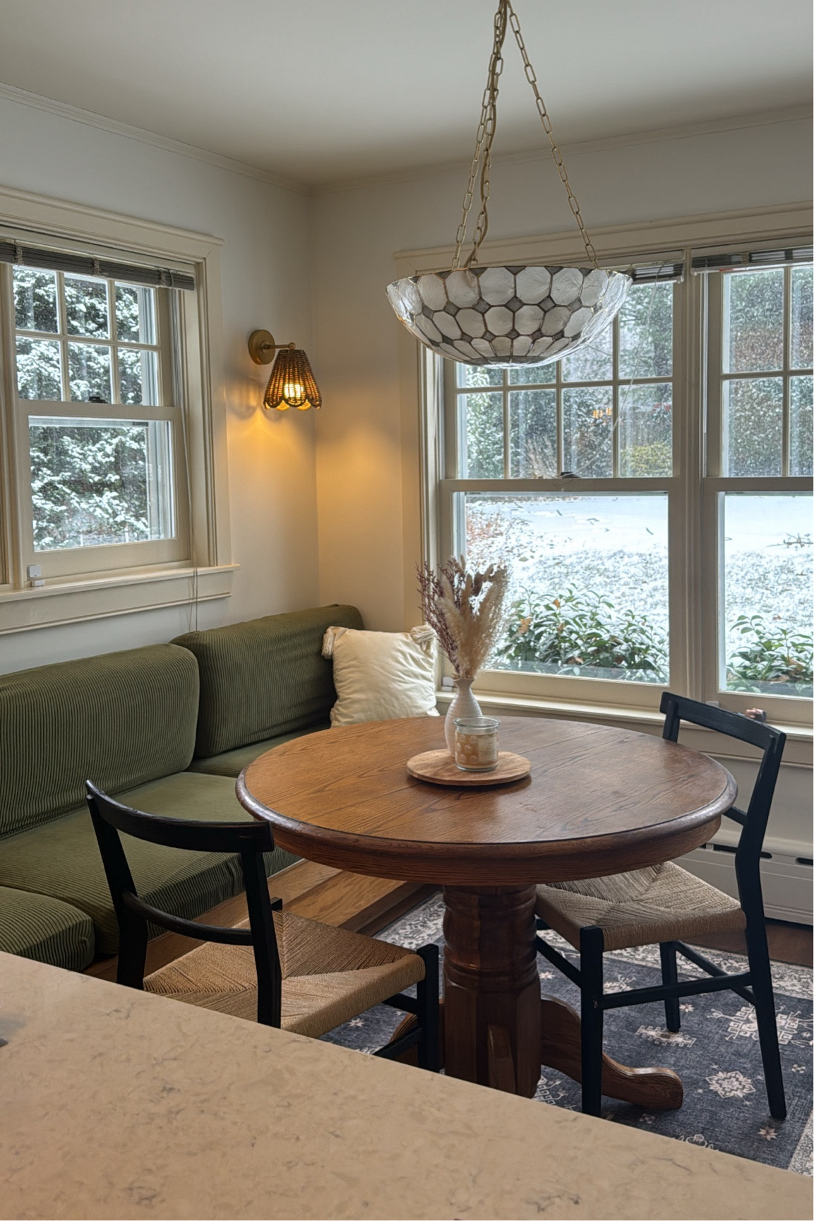 Kitchen nook 🤍 we got the Kismet sconces from Anthropologie on Black Friday sale but they’re sold out now! And the table I got for $5 at a thrift store and re-stained it 🤘

#LTKHome #LTKFamily #LTKGiftGuide