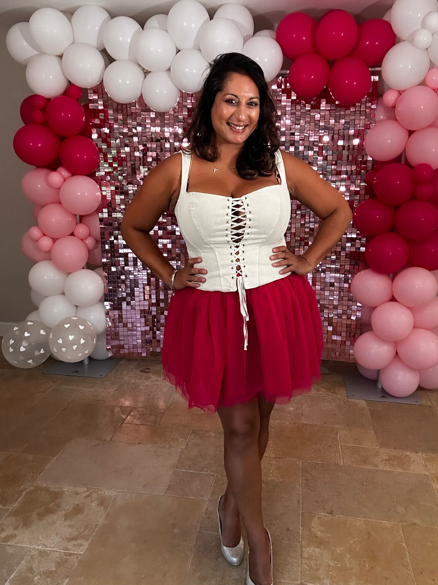 Pink skirt, cream corset 