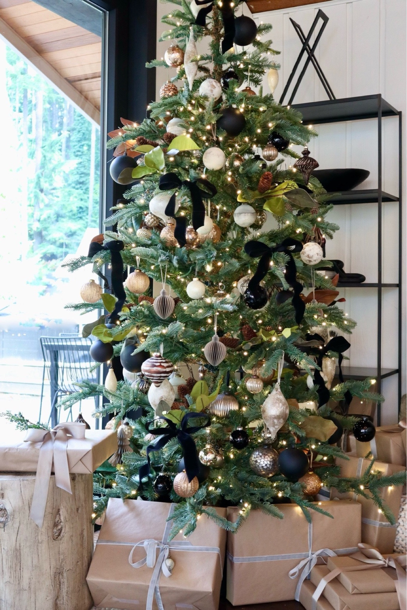 Our Christmas tree last year was my favorite one yet so I may just recreate it this year! 
Here’s how you can too with velvet ribbon, black ornaments, paper ornaments, amazon wrapping paper, and more! 

#LTKSeasonal #LTKfindsunder50 #LTKHoliday