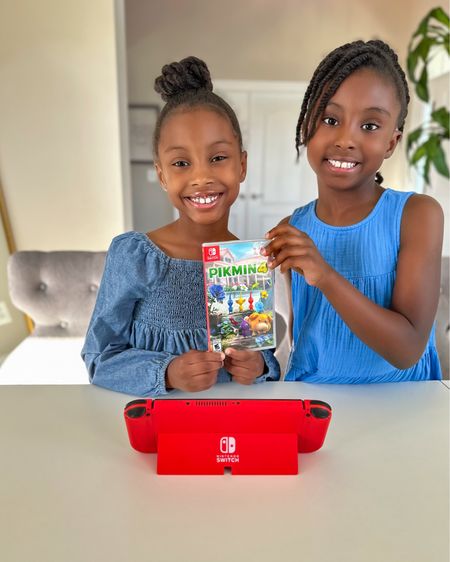 My girls have really enjoyed playing the Pikmin 4 game on their Nintendo Switch system! In this game you create your own explorer and go on an endearing expedition to a mysterious planet. Once there, your goal is to rescue fellow explorers through leading loyal Pikmin and your lovable canine companion Oatchi. The game requires a lot of problem solving, and the game's local 2-player co-op play for Story mode is a great way for my girls to play together and tackle these obstacles as a team! This game brings endless fun to our family! 

#LTKkids #LTKfindsunder50 #LTKfamily