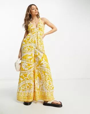 River Island paisley print plunge wide leg beach jumpsuit in yellow | ASOS (Global)