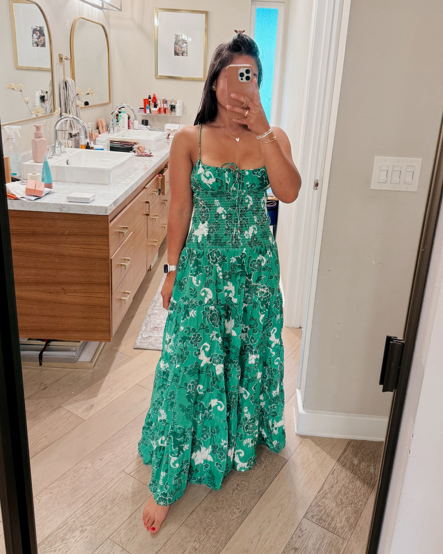 This dress is so pretty!! I love the smocked detail, drop waist and tiered skirt! This green floral print is also perfect for summer! I’m 5’3” and it hits the floor without shoes on, so nice length! I’m wearing a small! 

#LTKStyleTip #LTKFindsUnder100 #LTKSeasonal