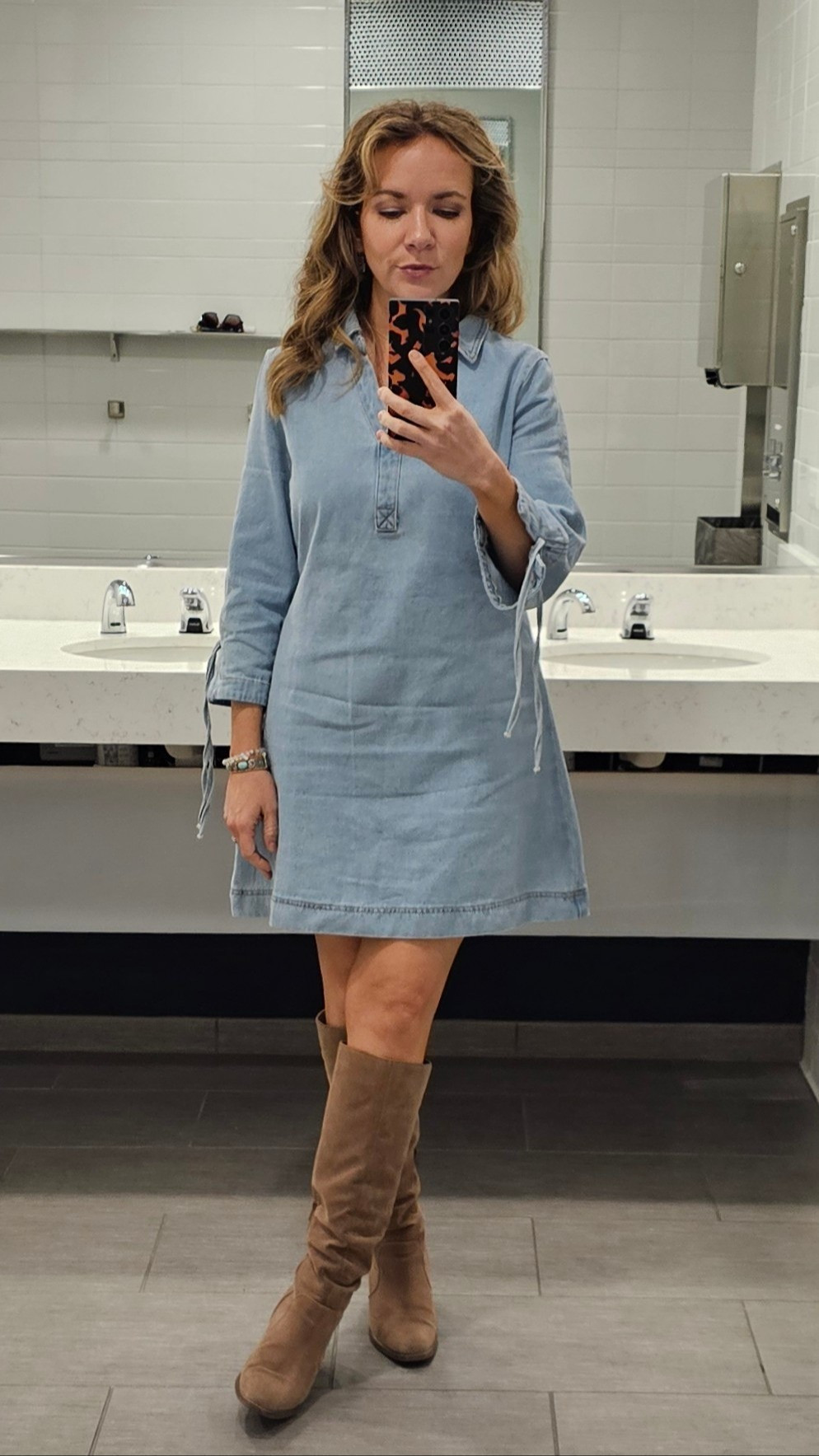 The cutest denim dress + flattering silhouette for spring. Boots are suede but could be paired with sneakers or clogs. I'm in a M.

#LTKFindsUnder50 #LTKStyleTip #LTKWorkwear