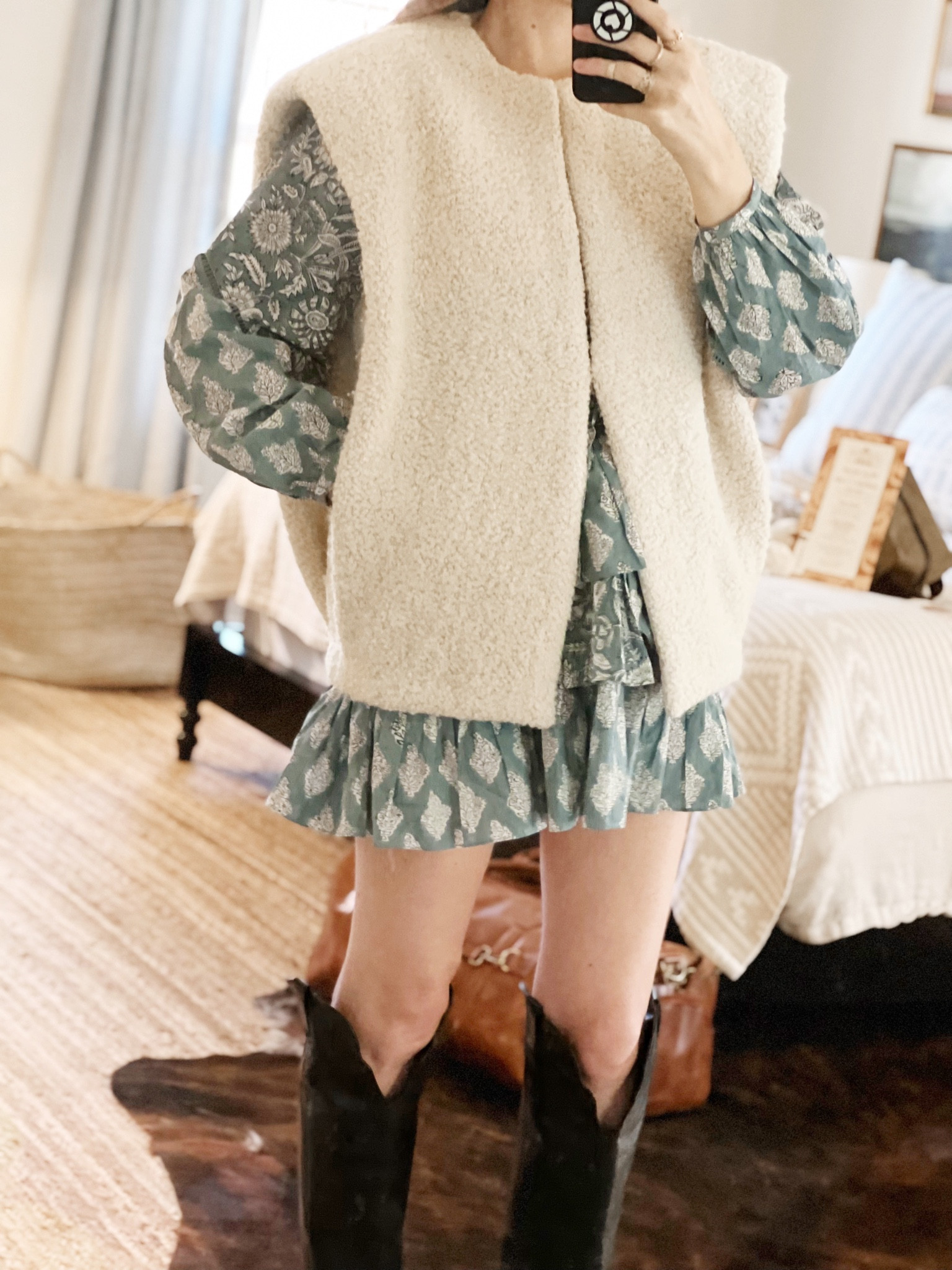 This dress is so flattering and I love it layered with this warm vest for cooler weather. 
I got this vest last year and they made it again this year. It is super warm and a total statement piece. 

#LTKtravel #LTKworkwear #LTKSeasonal