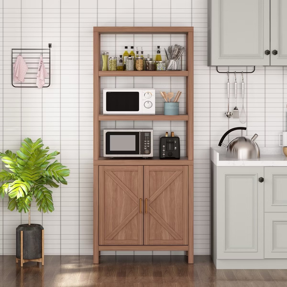 This freestanding wood shelving cabinet is one of those versatile pieces that works in so many rooms. Style it as a kitchen storage cabinet or pantry, or use it as a bookshelf in a living room, home office, or dining space. I love the mix of open shelves for styling books, decor, or appliances and closed storage below to keep things looking clean and organized.
I’ve tagged the exact piece shown, plus similar options if you’re looking for different finishes or sizes.
