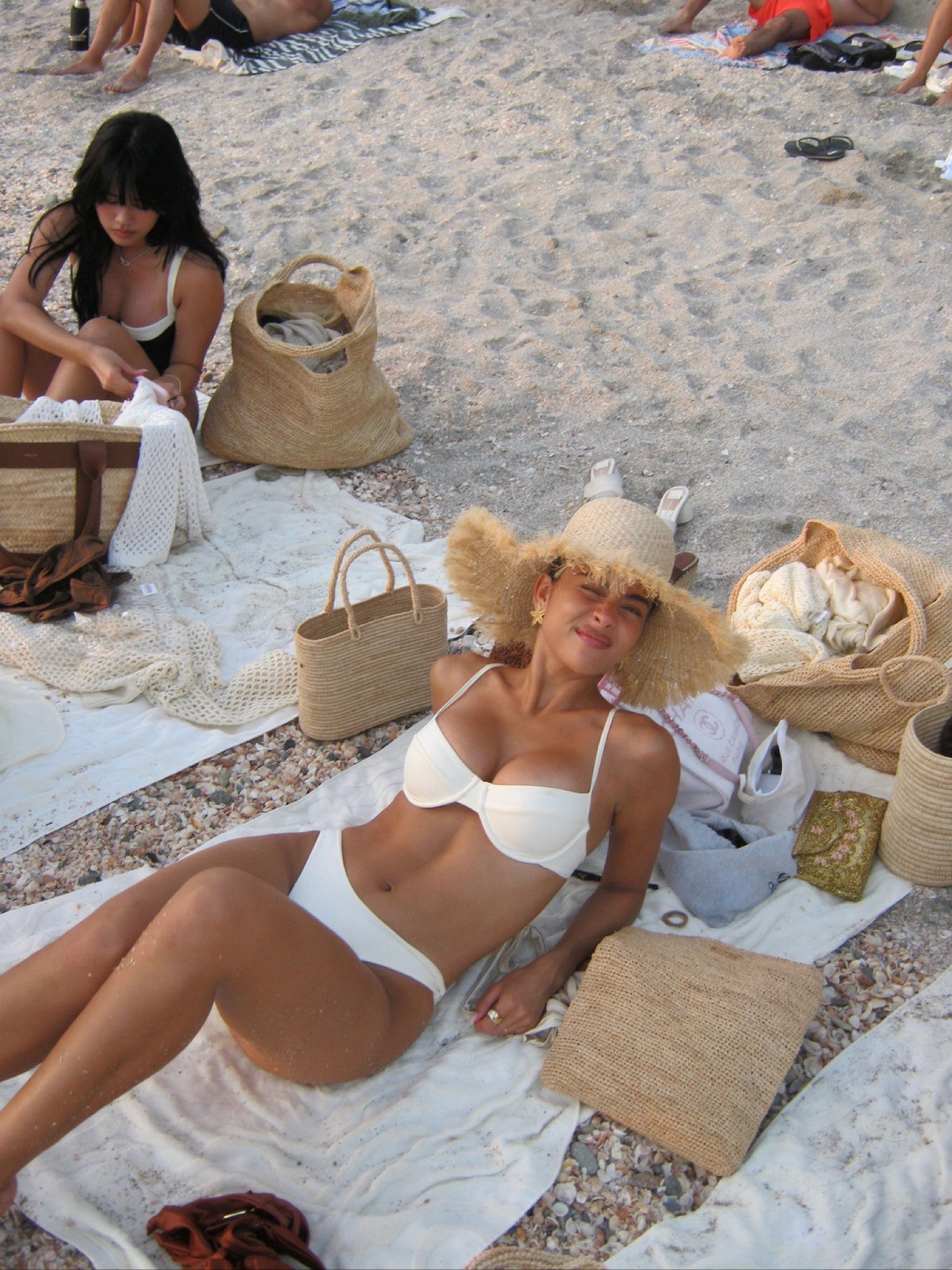 Bask in the sun with style! 🌞 Our chic white bikini from Monday is a must-have for beach days. Pair it with Monday's elegant woven bags and wide-brimmed hat to complete your perfect beach look. 🏖️✨ #MondayEssentials #BeachReady #SummerStyle #BikiniSeason

#LTKSwim #LTKItBag #LTKSummerSales