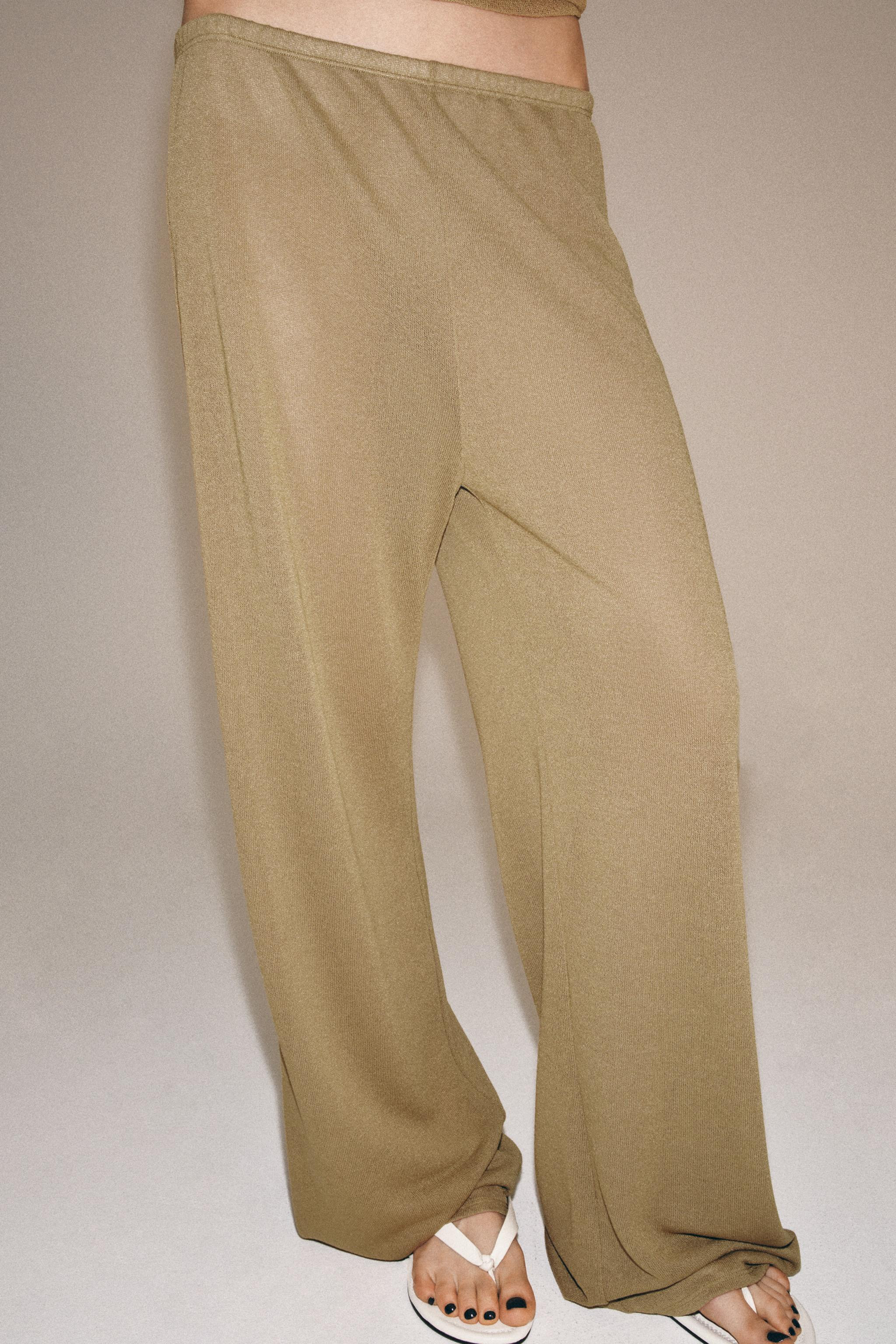 Model height: 178 cmTrousers made from a viscose blend yarn. Mid-waist with an elasticated waistb... | Zara UK