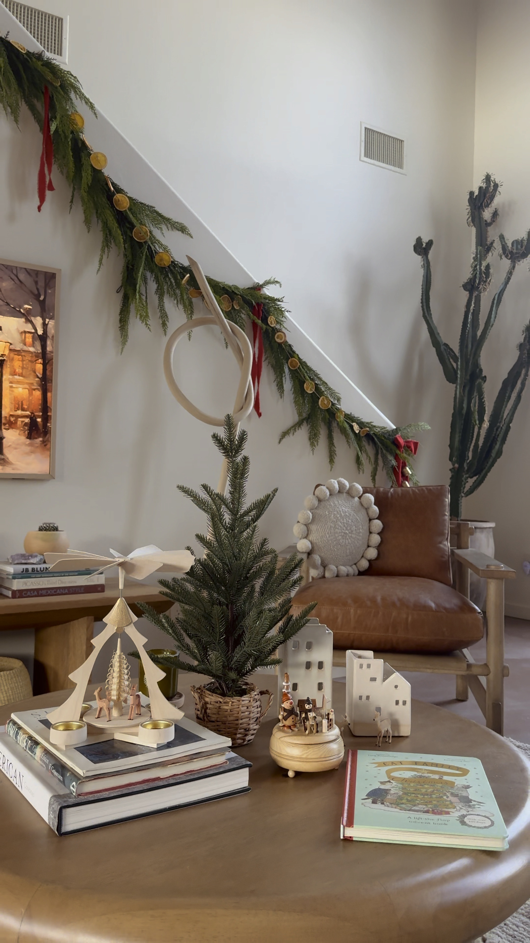 Christmas Coffee Table Decor 🎄 I love collecting these German wooden Christmas pyramids. They’re so beautiful with candles or on their own. They look great alongside my neutral village - had these for years and currently on sale! 

#LTKHoliday #LTKCyberWeek #LTKSeasonal