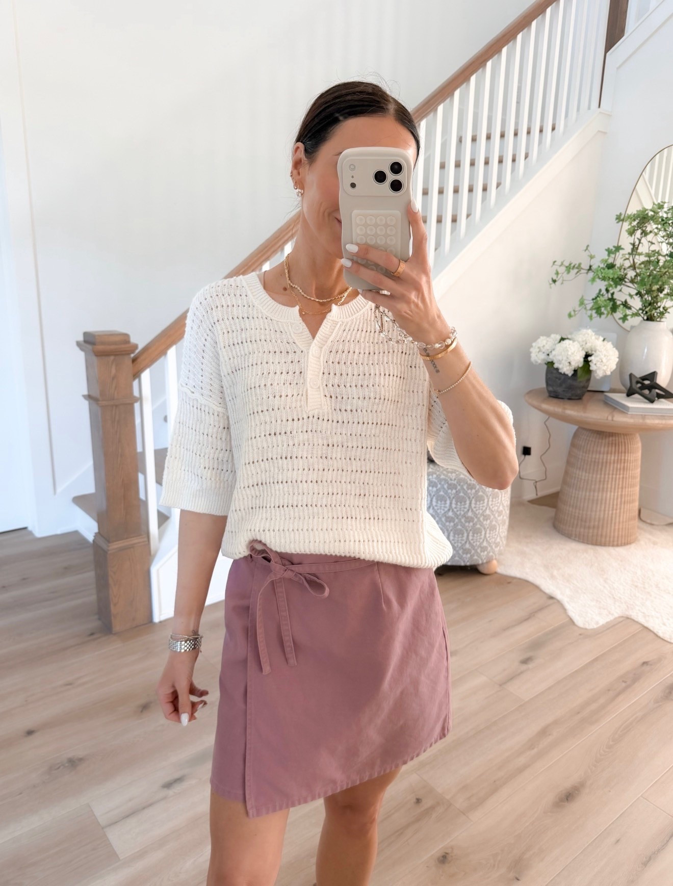 this combo is so easy and cute. lightweight knit + mini skirt = the perfect in between weather outfit

spring outfit, casual chic, everyday style, neutral outfit, effortless look, annabrstyle 

#LTKootd #LTKOver40 #LTKSeasonal