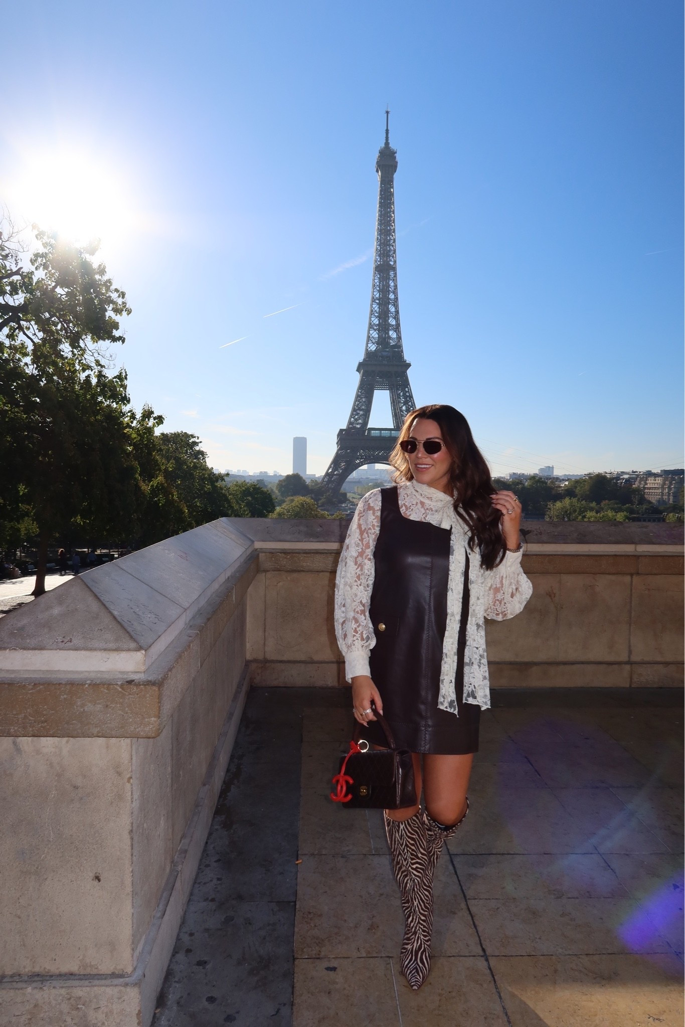 curvy midsize fall look! wearing size medium in lace long sleeve bow top and size 8 in chocolate brown faux leather dress 🤎 obsessed with my zebra boots! they are fabric and so lightweight. what i wore for a day of shopping and eating in Paris!

#LTKSeasonal #LTKMidsize #LTKTravel